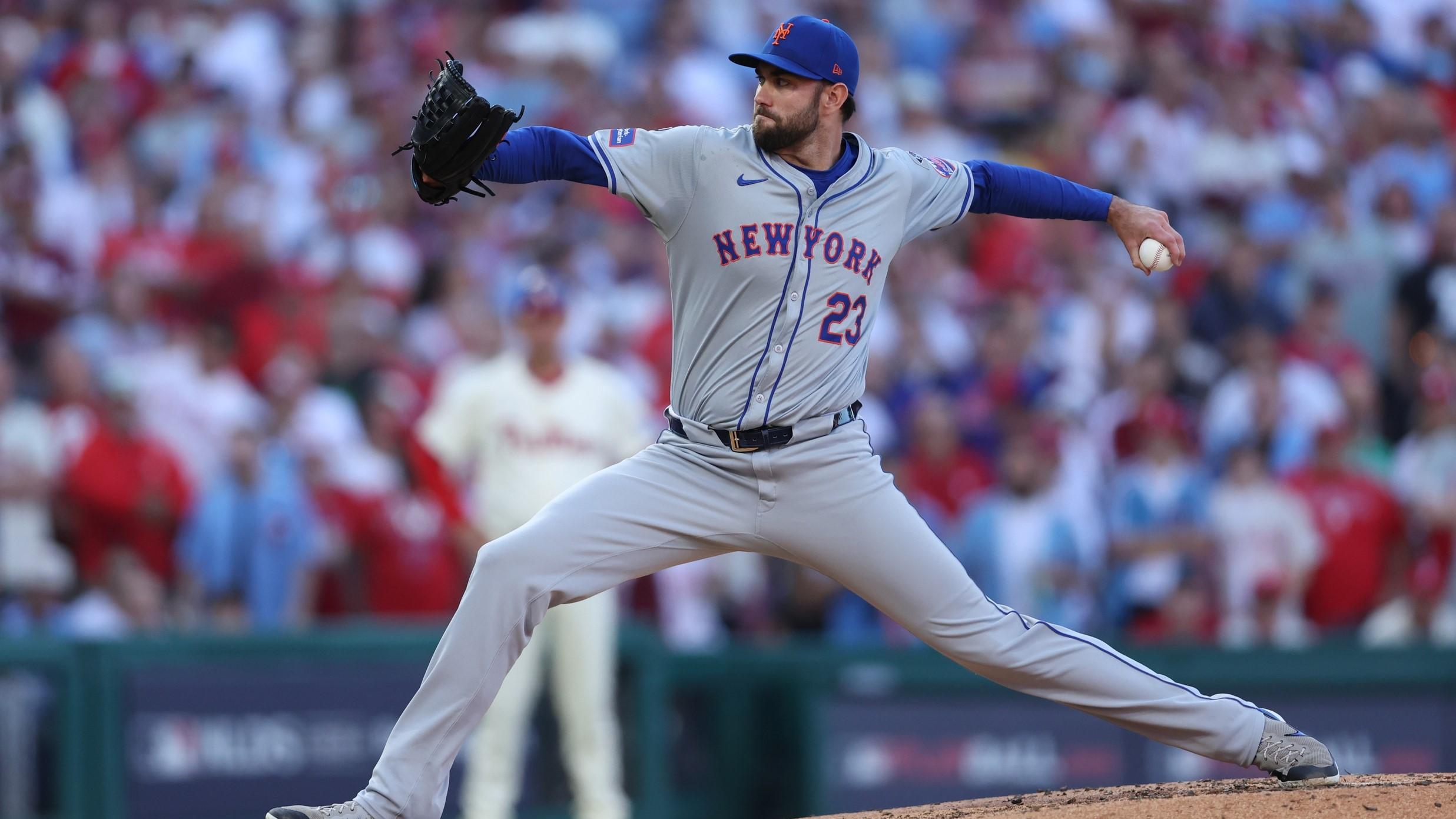 Oct 5, 2024; Philadelphia, PA, USA; New York Mets pitcher David Peterson (23) throws a pitch against the Philadelphia Phillies in the third inning in game one of the NLDS for the 2024 MLB Playoffs at Citizens Bank Park.