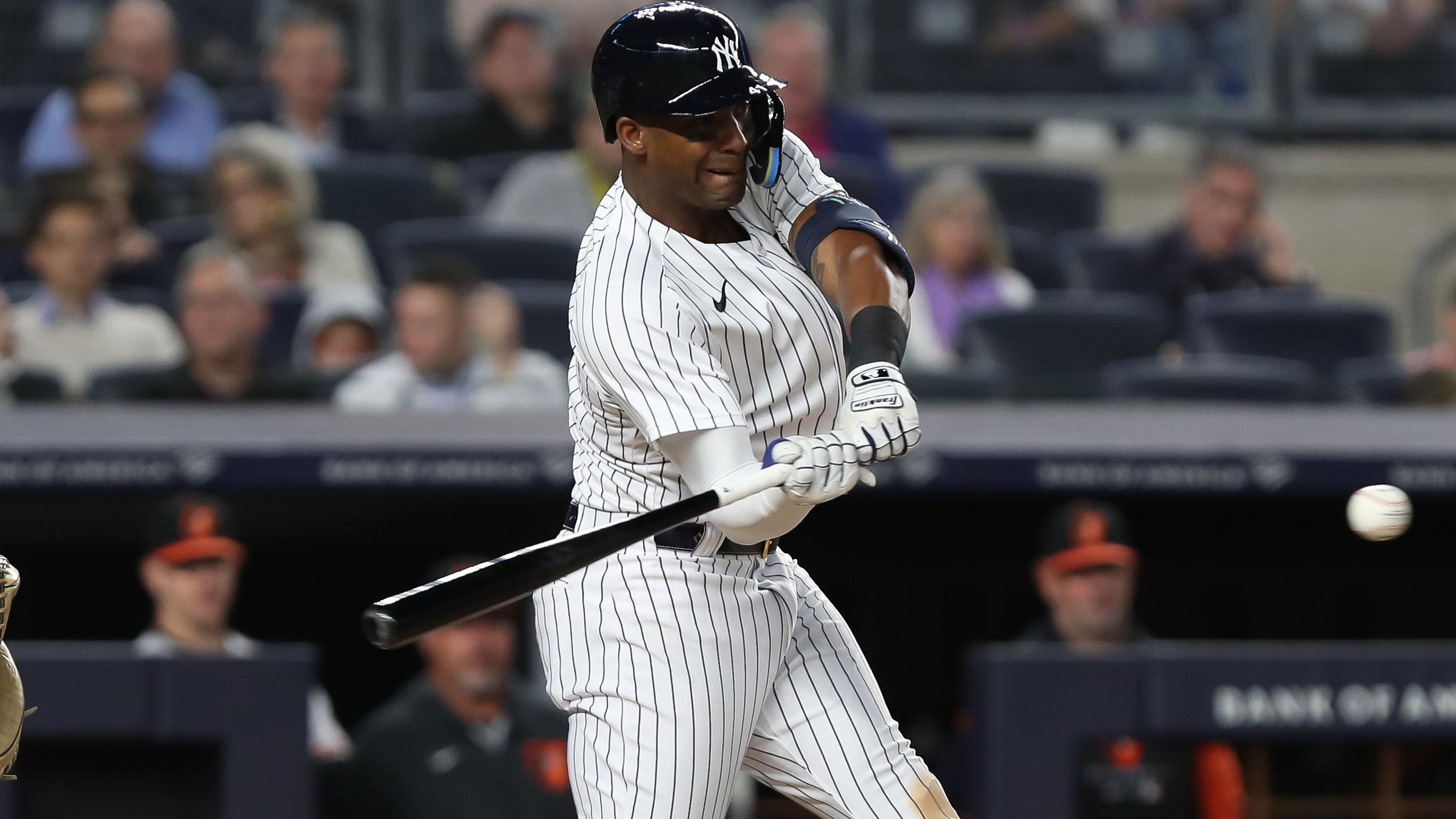 May 25, 2022; Bronx, New York, USA; New York Yankees left fielder Miguel Andujar (41) drives in an RBI on a single against the Baltimore Orioles during the fourth inning at Yankee Stadium.