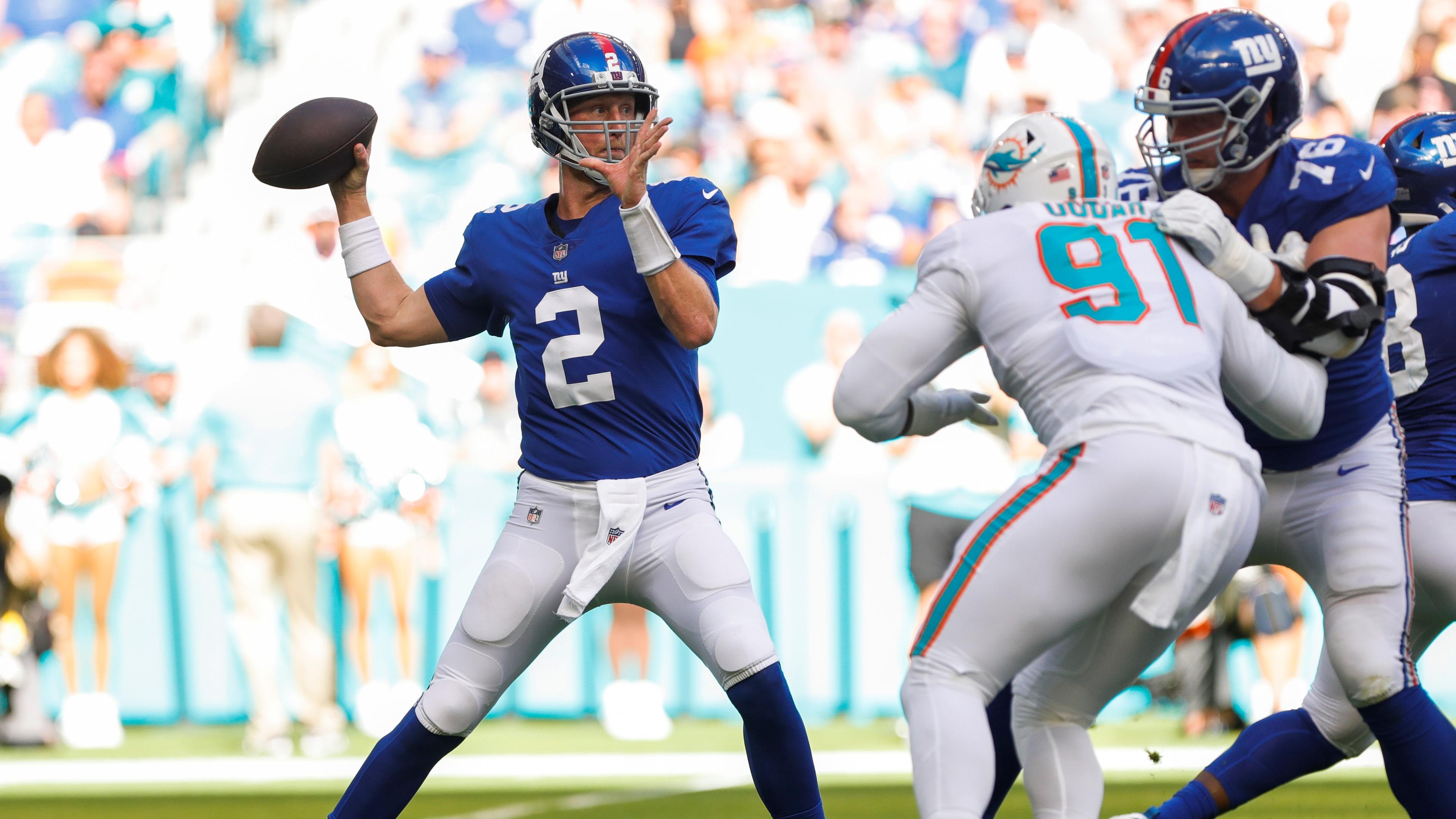 New York Giants quarterback Mike Glennon (2) throws the football against the Miami Dolphins during the first half at Hard Rock Stadium.