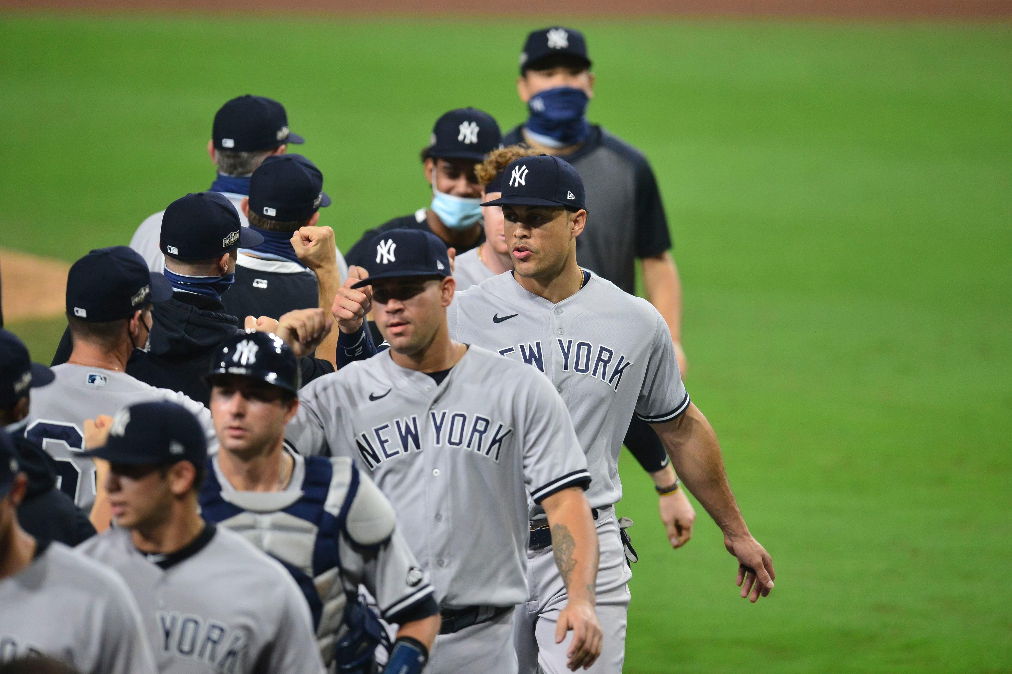 Yankees celebrate after winning Game 1 of ALDS / USA TODAY