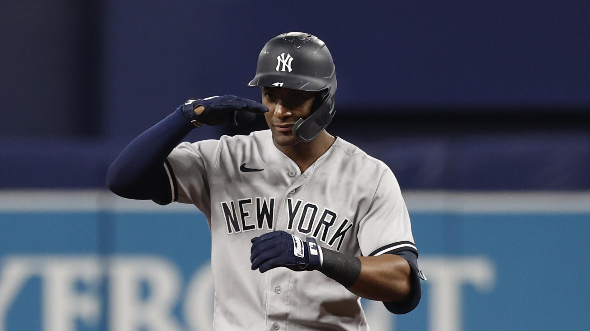 May 27, 2022; St. Petersburg, Florida, USA;New York Yankees left fielder Miguel Andujar (41) doubles during the ninth inning against the Tampa Bay Rays at Tropicana Field. Mandatory Credit: Kim Klement-USA TODAY Sports