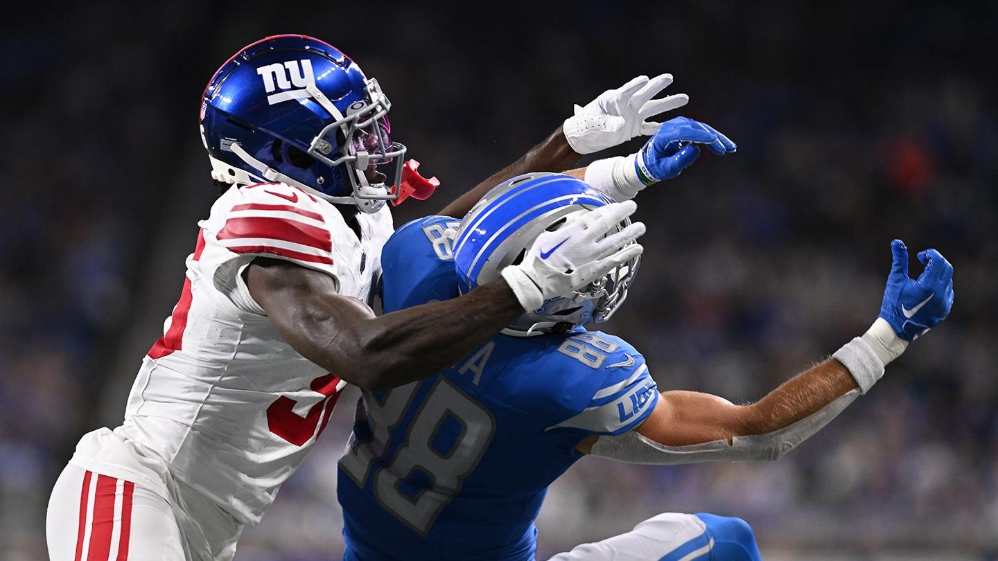 New York Giants cornerback Deonte Banks (36) breaks up a pass intended for Detroit Lions wide receiver Chase Cota (88) in the first quarter at Ford Field