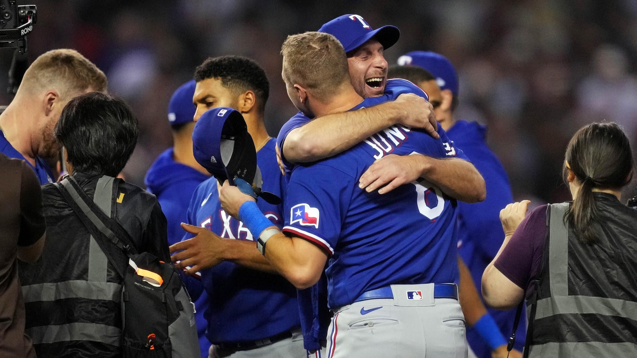 Texas Rangers pitcher Max Scherzer celebrates with third baseman Josh Jung (6) celebrate after the Texas Rangers beat the Arizona Diamondbacks to win the World Series in game five of the 2023 World Series at Chase Field in Phoenix on Nov. 1, 2023.