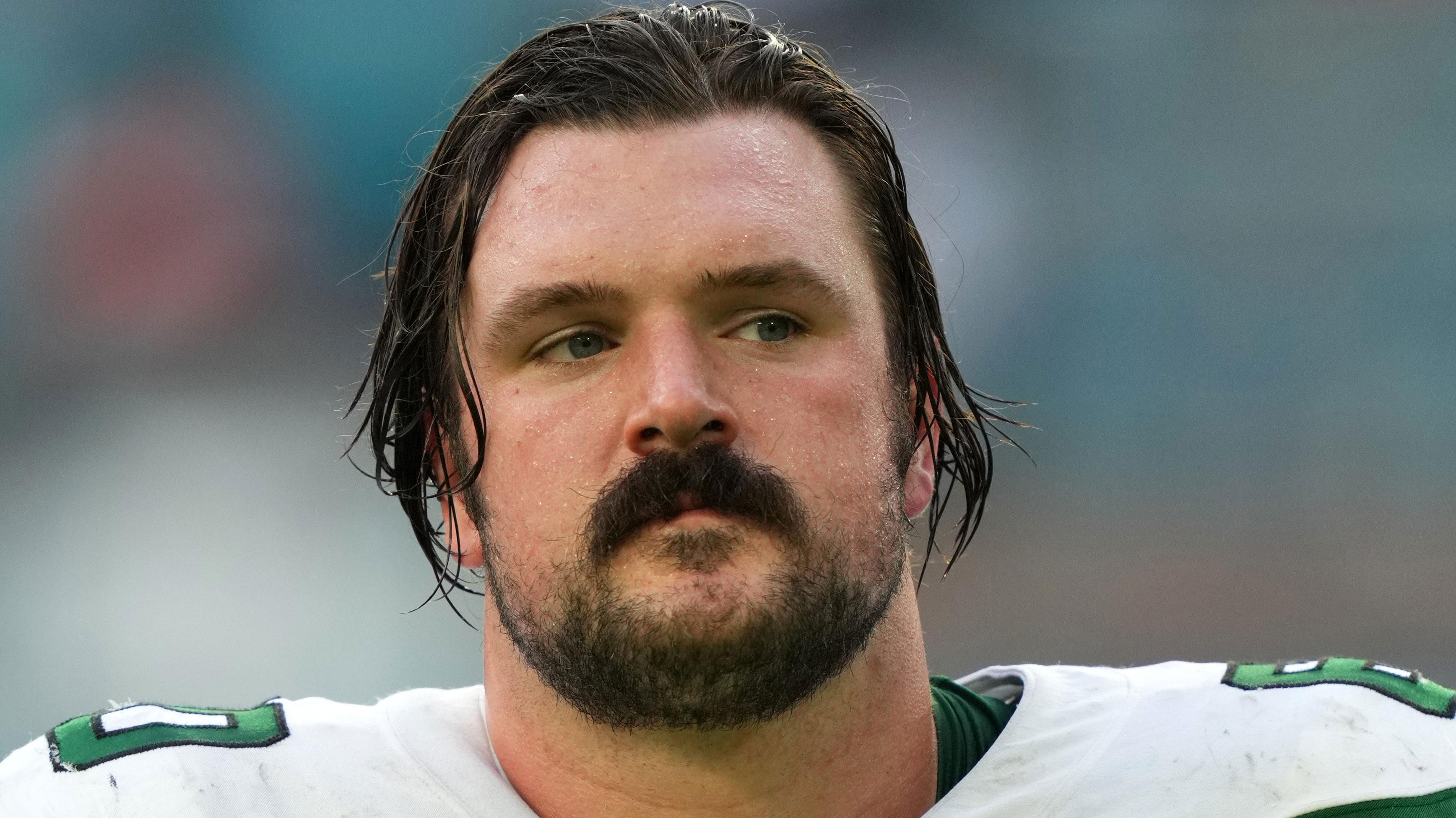 Dec 19, 2021; Miami Gardens, Florida, USA; New York Jets center Connor McGovern (60) leaves the field after the game against the Miami Dolphins at Hard Rock Stadium.