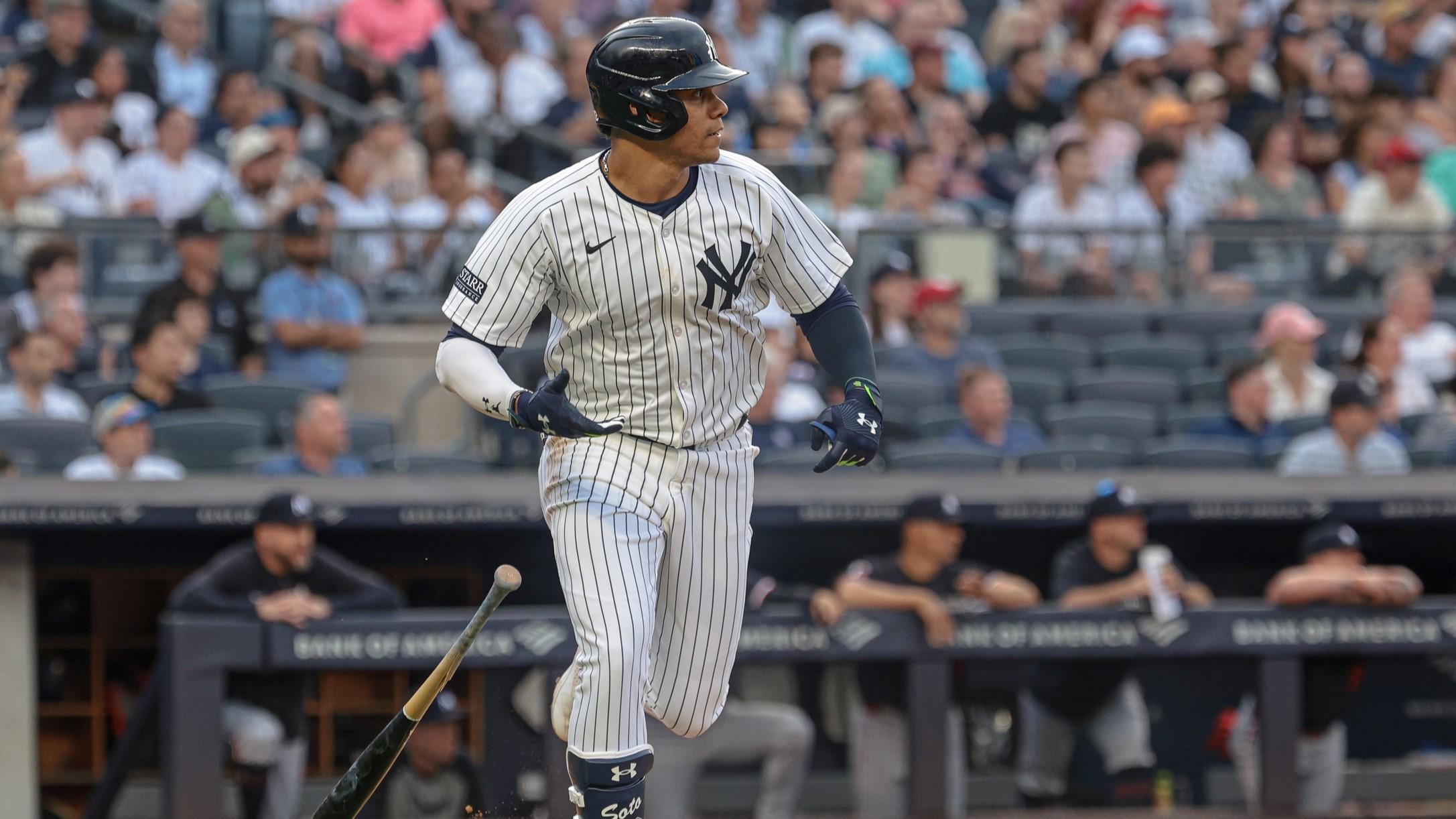 Jun 5, 2024; Bronx, New York, USA; New York Yankees right fielder Juan Soto (22) singles during the first inning against the Minnesota Twins at Yankee Stadium. 