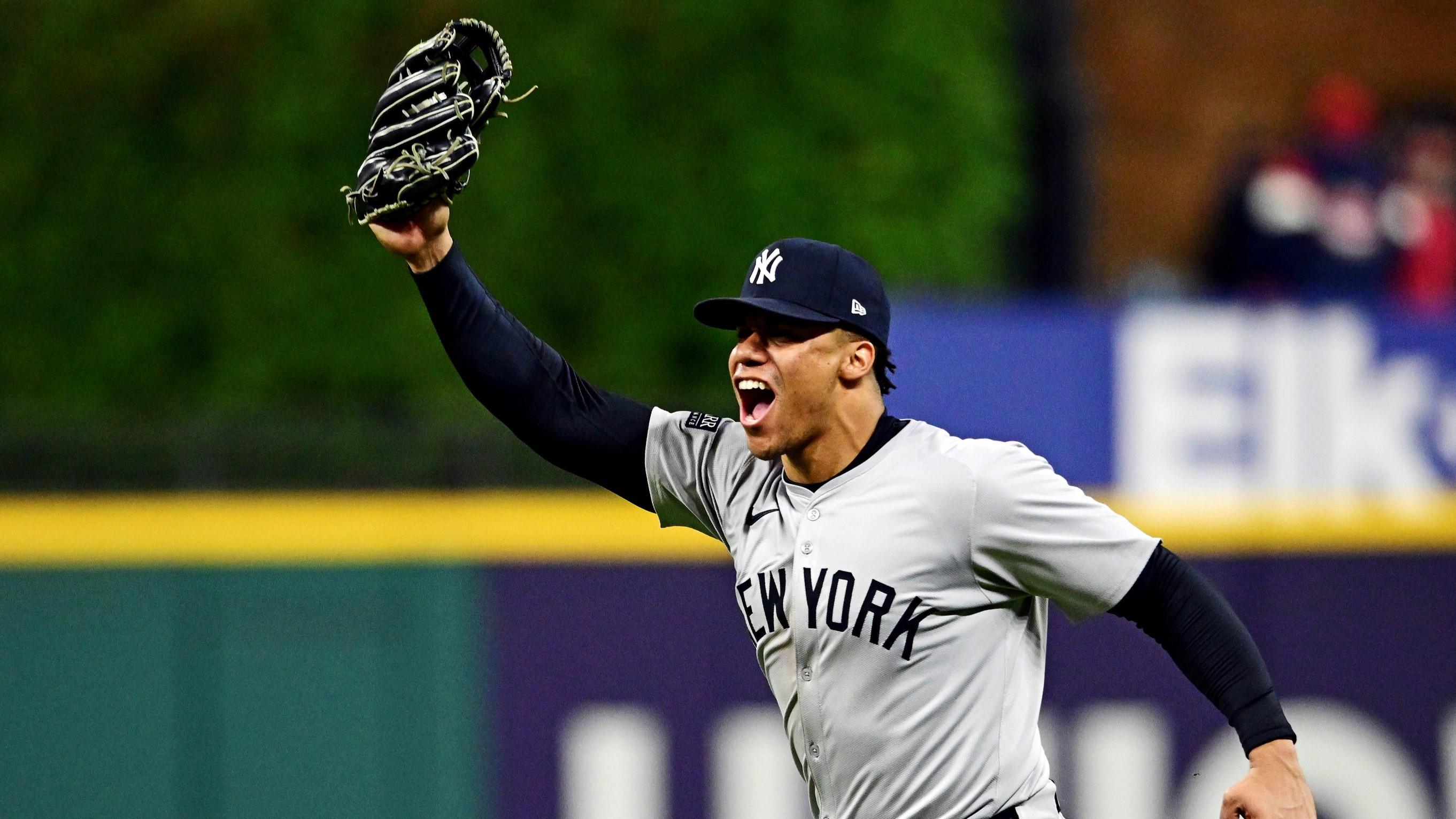 Oct 19, 2024; Cleveland, Ohio, USA; New York Yankees outfielder Juan Soto (22) celebrates after making the final out to beat the Cleveland Guardians during game five of the ALCS for the 2024 MLB playoffs at Progressive Field.