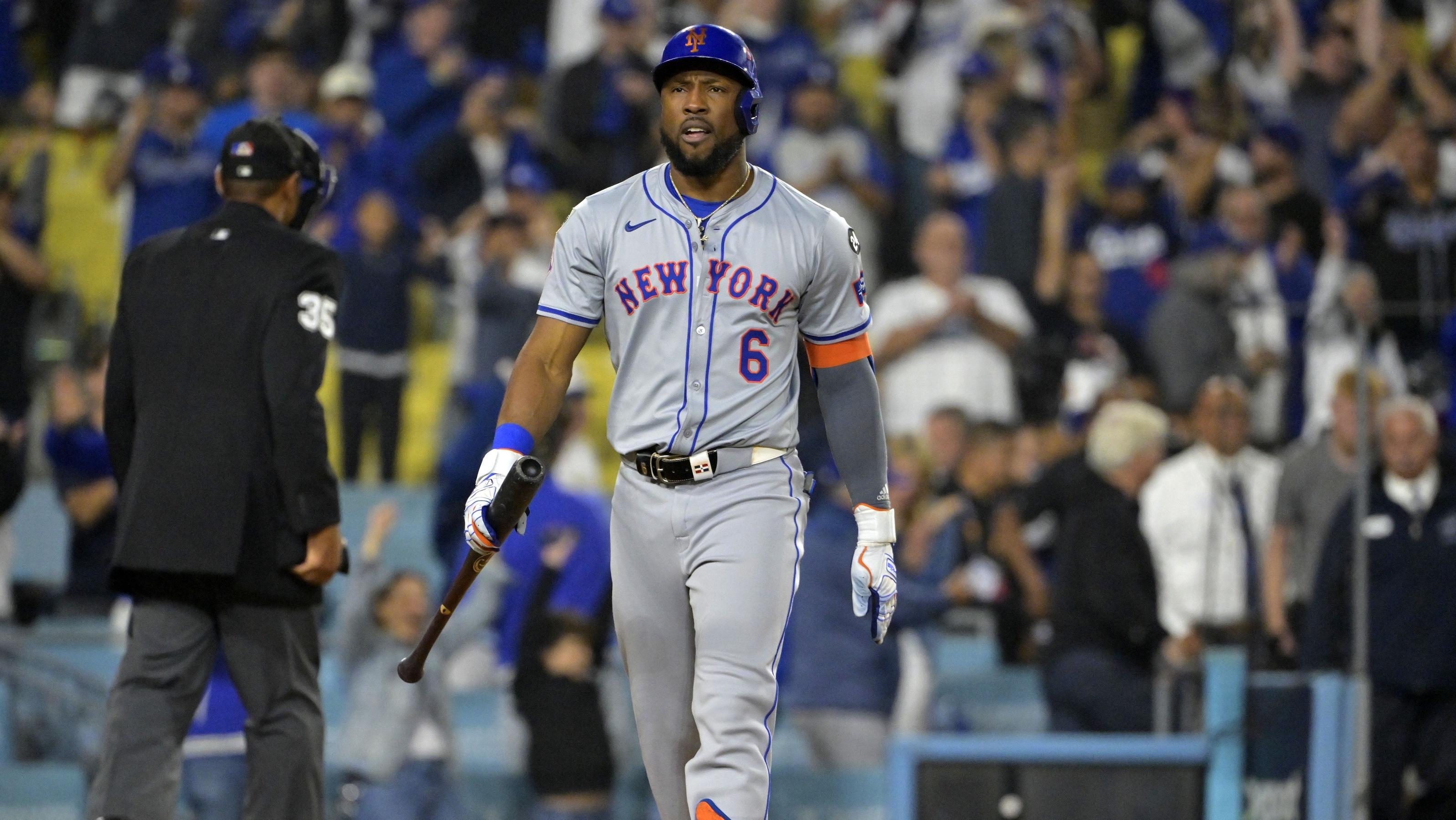 New York Mets outfielder Starling Marte (6) reacts after a strike out in the ninth inning during game one of the NLCS for the 2024 MLB Playoffs at Dodger Stadium.