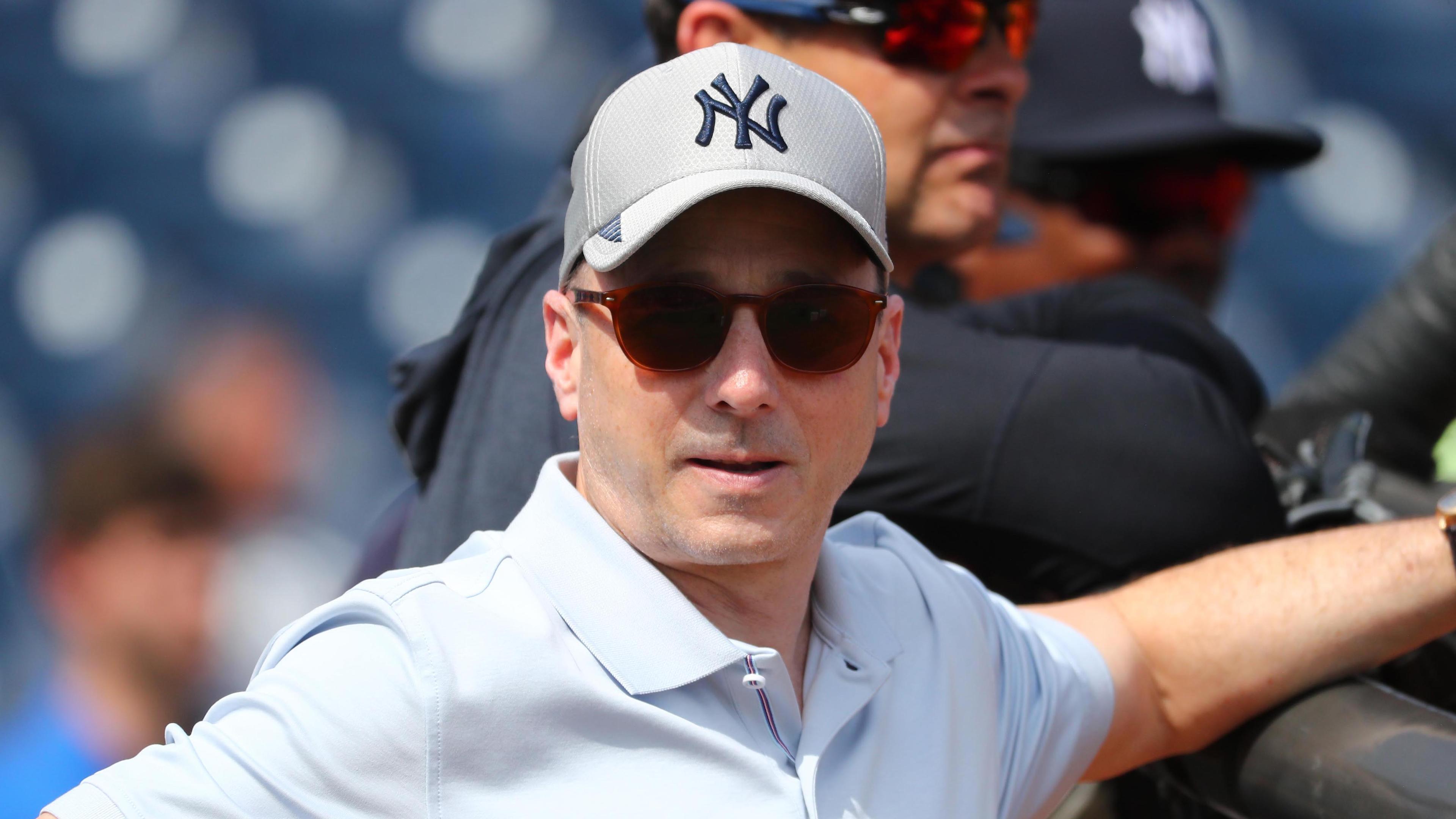 Brian Cashman up close with glasses on