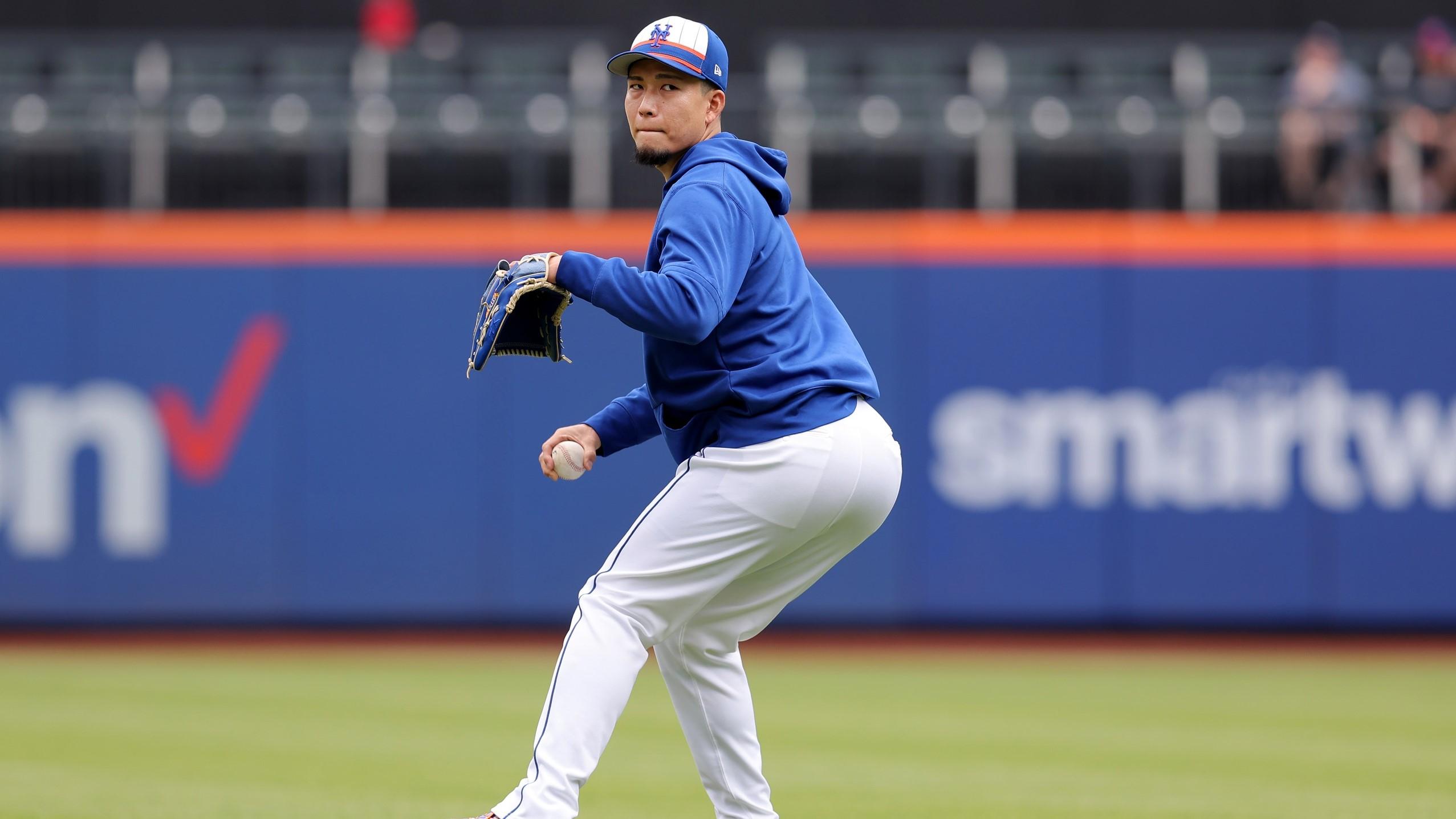 May 14, 2024; New York City, New York, USA; New York Mets injured pitcher Kodai Senga (34) throws in the outfield before a game against the Philadelphia Phillies at Citi Field.