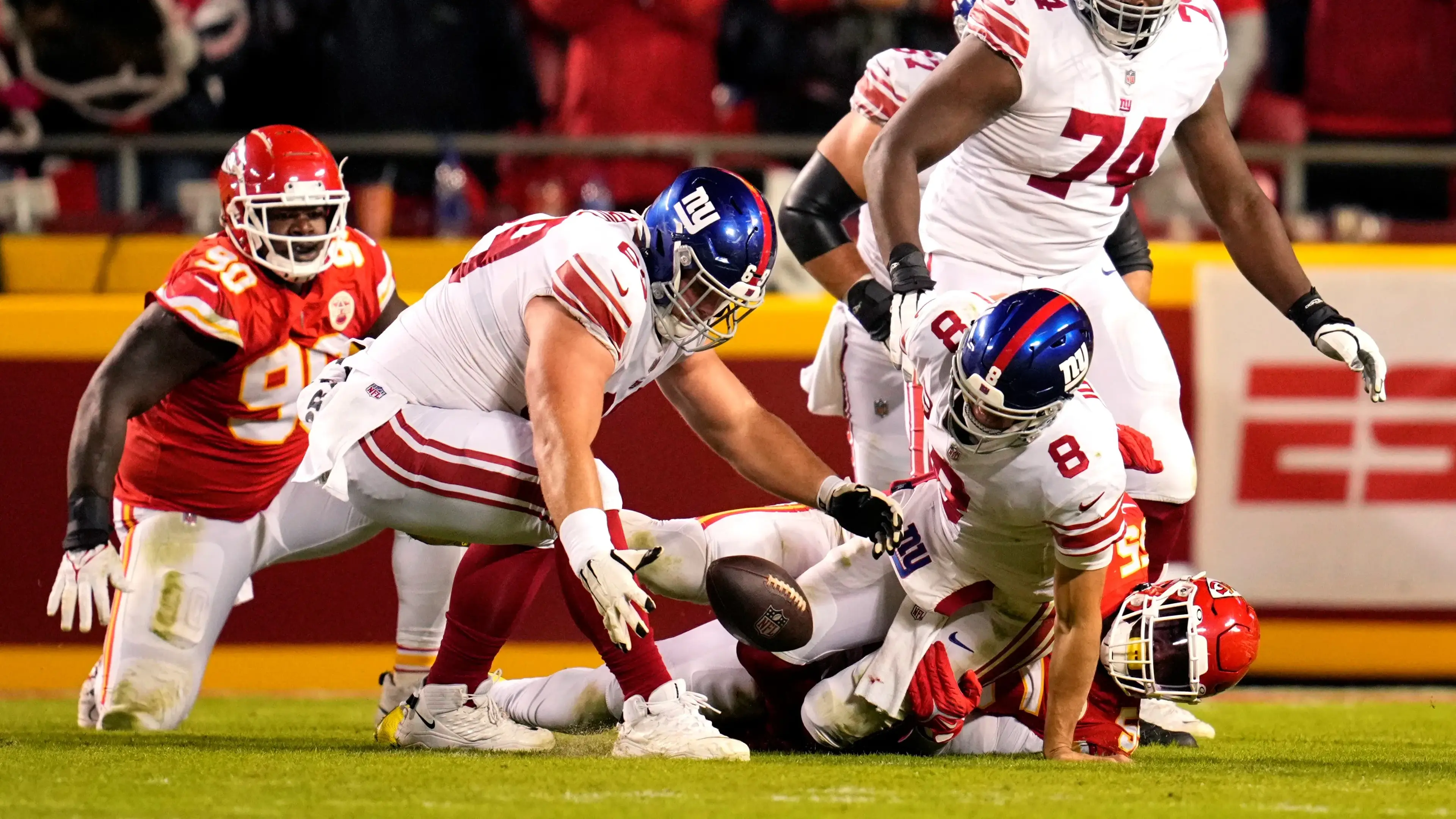 Nov 1, 2021; Kansas City, Missouri, USA; Kansas City Chiefs defensive end Frank Clark (55) forces a fumble on New York Giants quarterback Daniel Jones (8) during the second half at GEHA Field at Arrowhead Stadium. Mandatory Credit: Jay Biggerstaff-USA TODAY Sports / Jay Biggerstaff-USA TODAY Sports