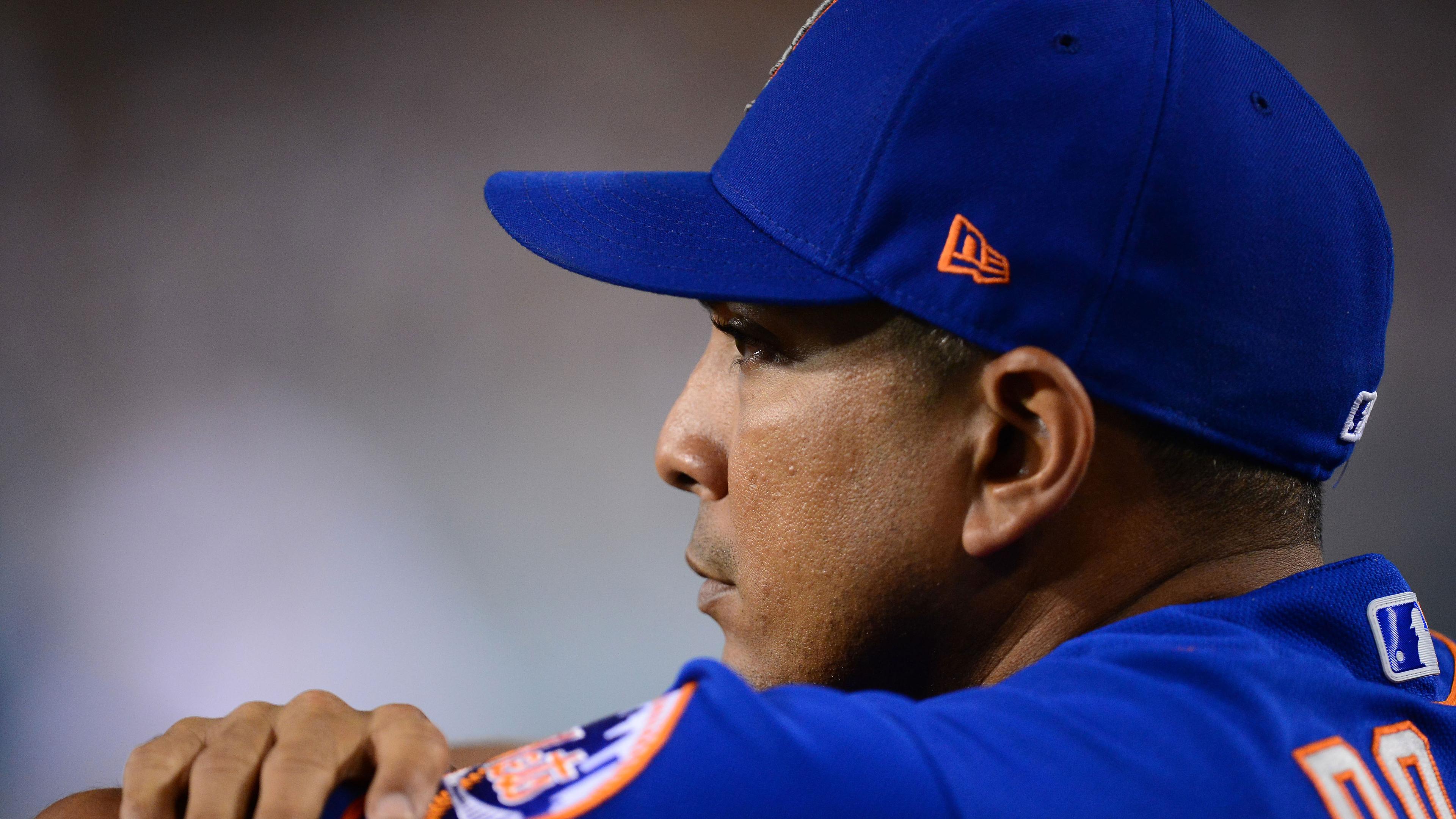 Aug 19, 2021; Los Angeles, California, USA; New York Mets manager Luis Rojas (19) watches game action against the Los Angeles Dodgers during the eighth inning at Dodger Stadium.