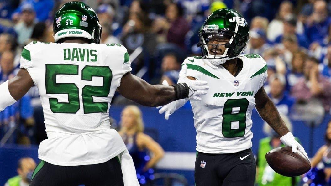 Nov 4, 2021; Indianapolis, Indiana, USA; New York Jets wide receiver Elijah Moore (8) celebrates a touchdown in the first quarter against the Indianapolis Colts at Lucas Oil Stadium. / Trevor Ruszkowski-USA TODAY Sports