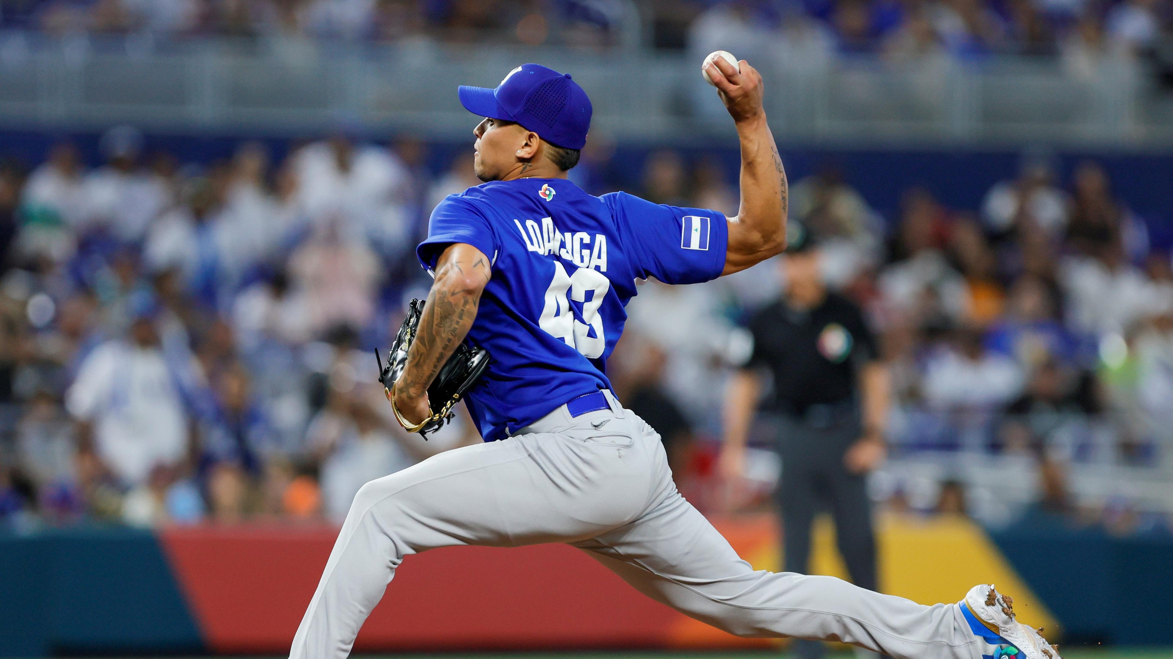 Mar 12, 2023; Miami, Florida, USA; Nicaragua relief pitcher Jonathan Loaisiga (43) delivers a pitch during the eighth inning against Israel at LoanDepot Park. Mandatory Credit: Sam Navarro-USA TODAY Sports