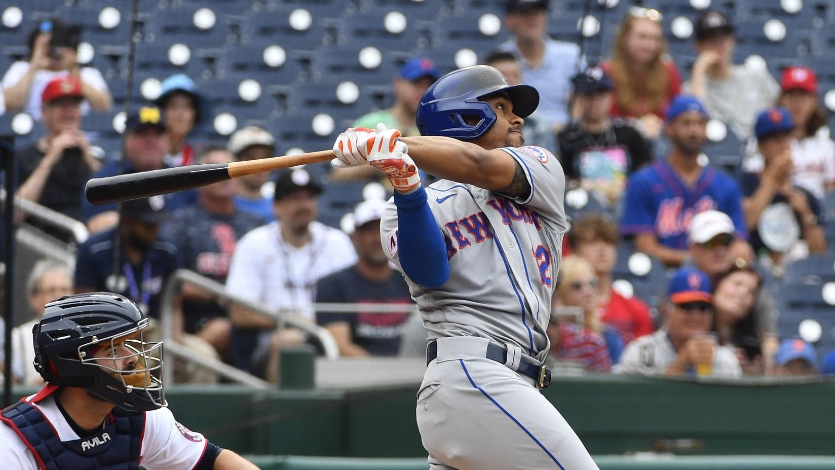 Jun 19, 2021; Washington, District of Columbia, USA; New York Mets shortstop Francisco Lindor (12) hits a two run home run against the Washington Nationals during the first inning at Nationals Park.