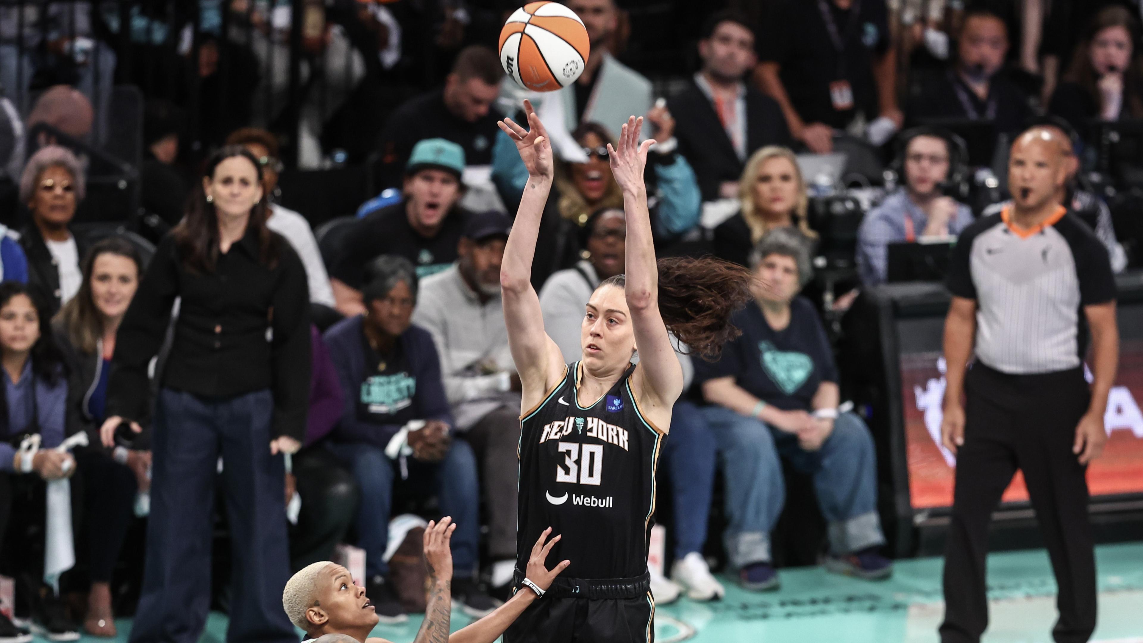 Oct 20, 2024; Brooklyn, New York, USA; New York Liberty forward Breanna Stewart (30) shoots over Minnesota Lynx guard Courtney Williams (10) in the first quarter during game five of the 2024 NBA Finals at Barclays Center. Mandatory Credit: Wendell Cruz-Imagn Images