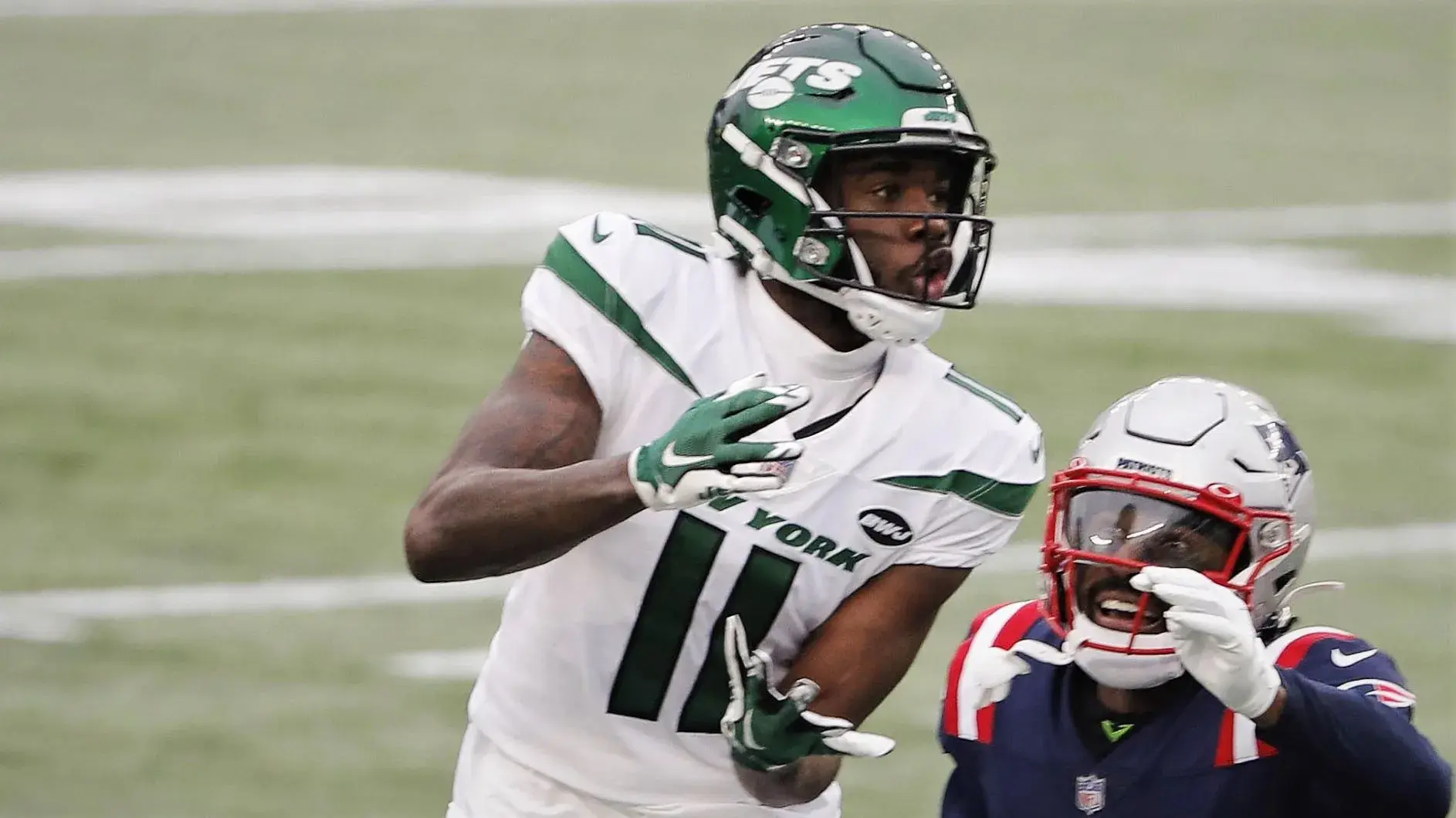 Jan 3, 2021; Foxborough, Massachusetts, USA; New York Jets wide receiver Denzel Mims (11) goes up for a catch over New England Patriots cornerback Joejuan Williams (33) during the first half at Gillette Stadium. Mandatory Credit: Winslow Townson-USA TODAY Sports / © Winslow Townson-USA TODAY Sports