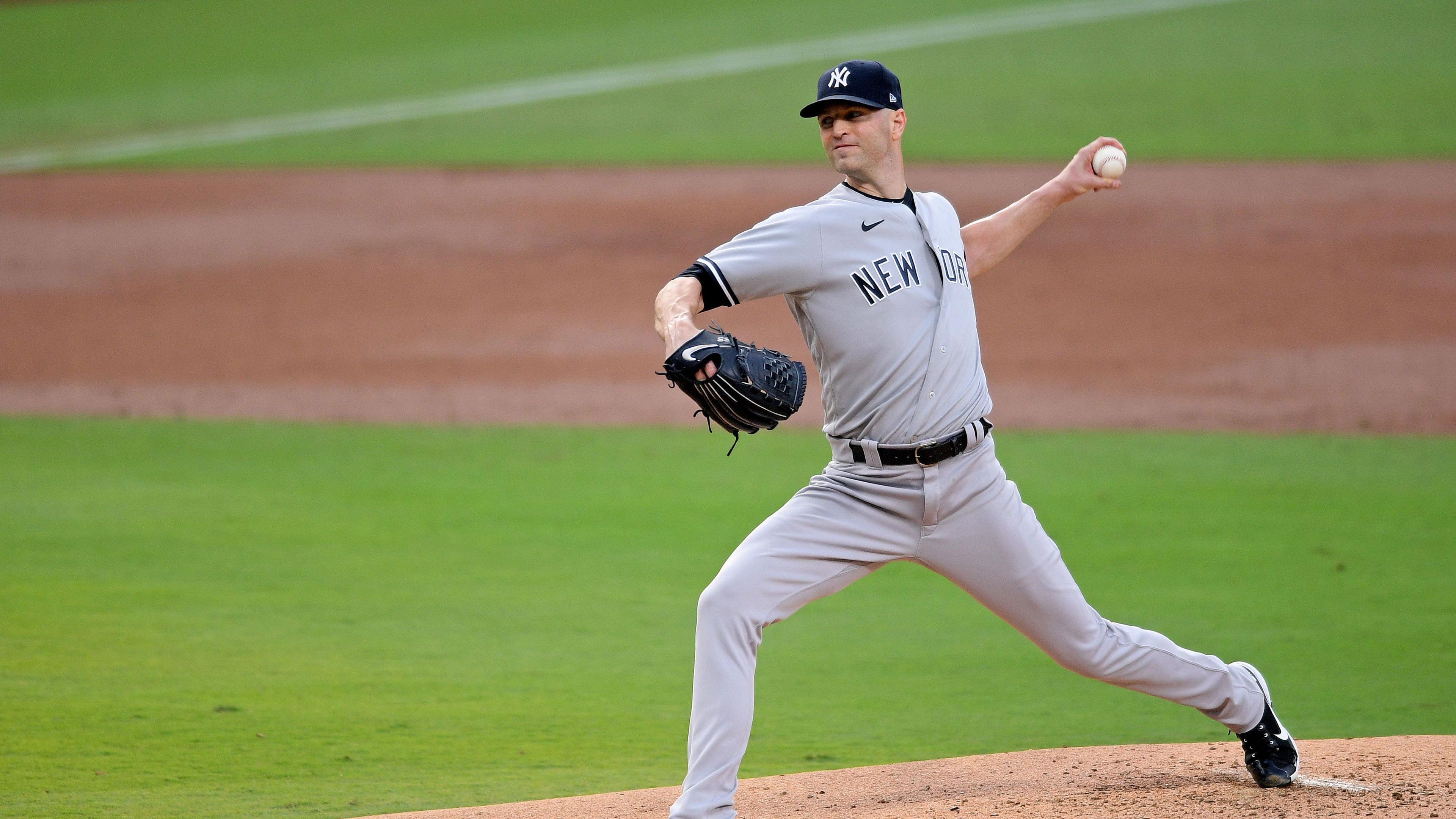 New York Yankees starting pitcher J.A. Happ (33) delivers a pitch in the 2nd inning against the Tampa Bay Rays during game two of the 2020 ALDS at Petco Park. / Orlando Ramirez-USA TODAY Sports