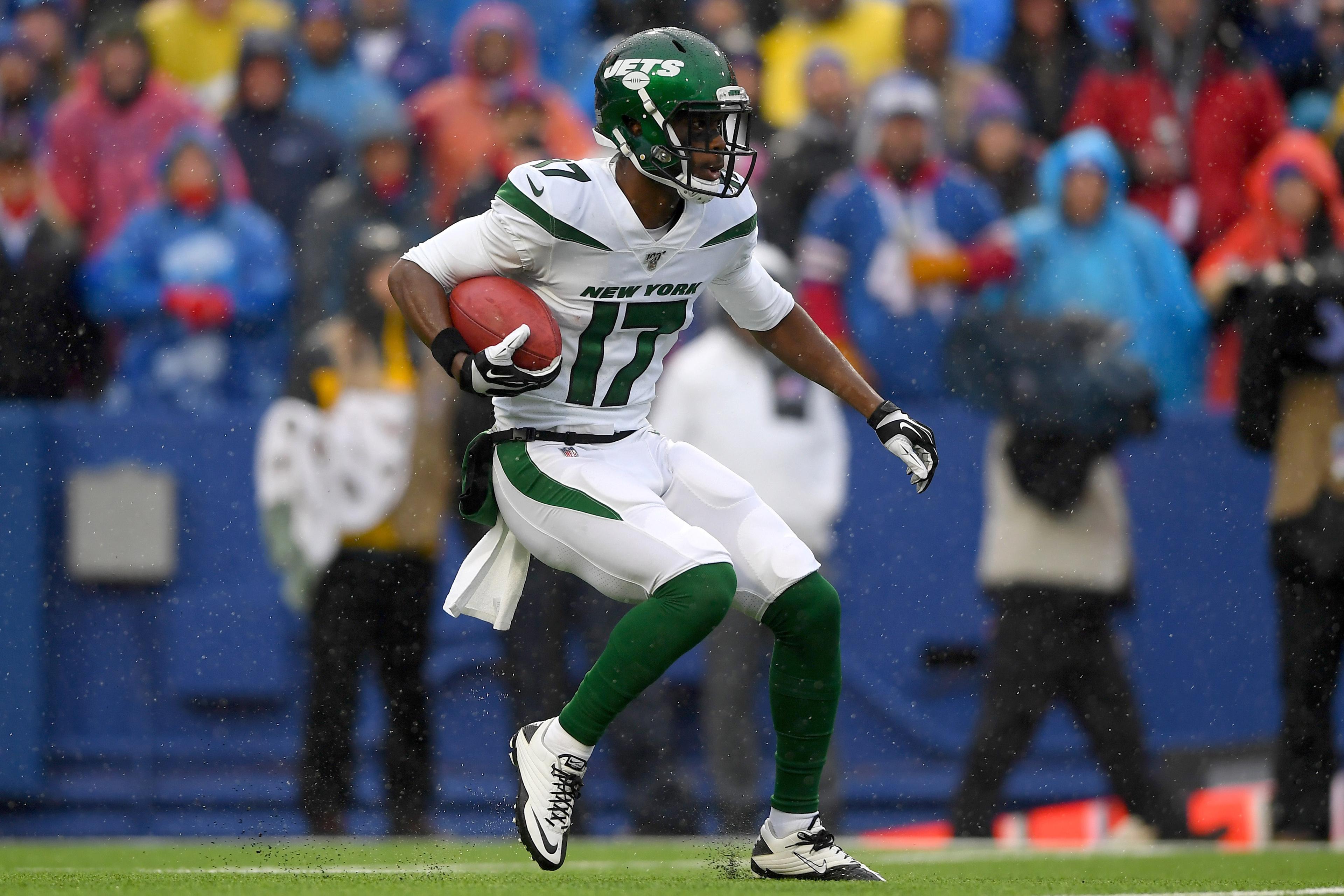 Dec 29, 2019; Orchard Park, New York, USA; New York Jets wide receiver Vyncint Smith (17) returns a kick-off against the Buffalo Bills during the first quarter at New Era Field. Mandatory Credit: Rich Barnes-USA TODAY Sports