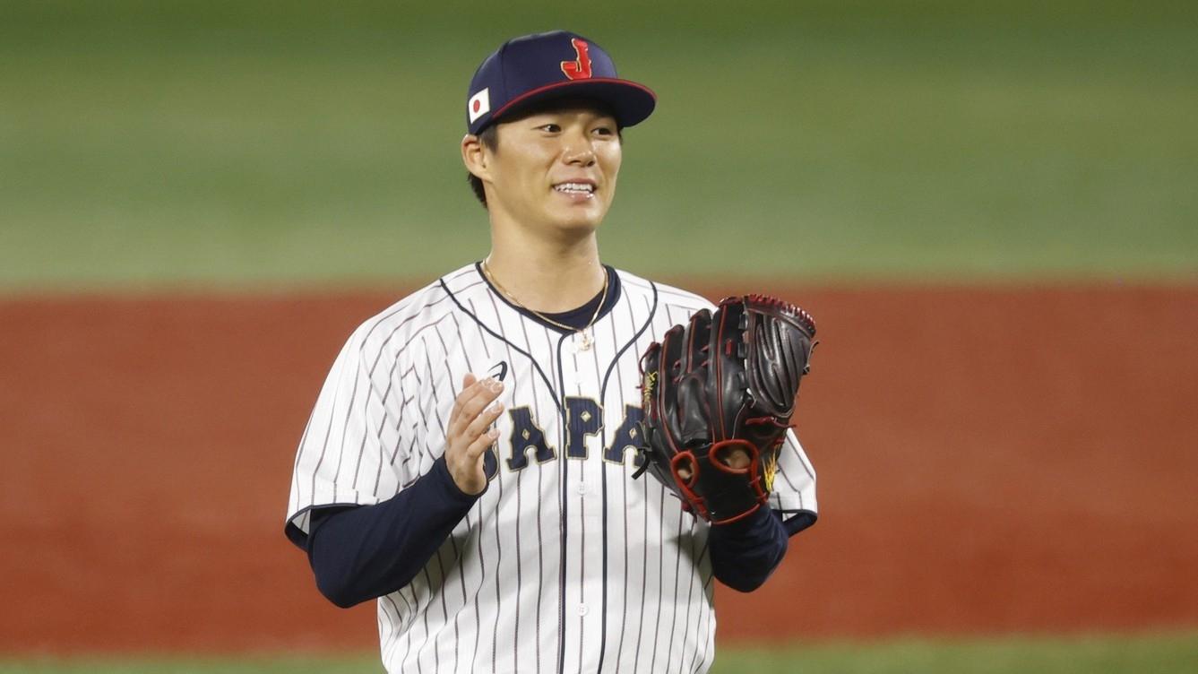 Japan pitcher Yoshinobu Yamamoto (17) reacts against Korea in a baseball semifinal match during the Tokyo 2020 Olympic Summer Games at Yokohama Baseball Stadium.