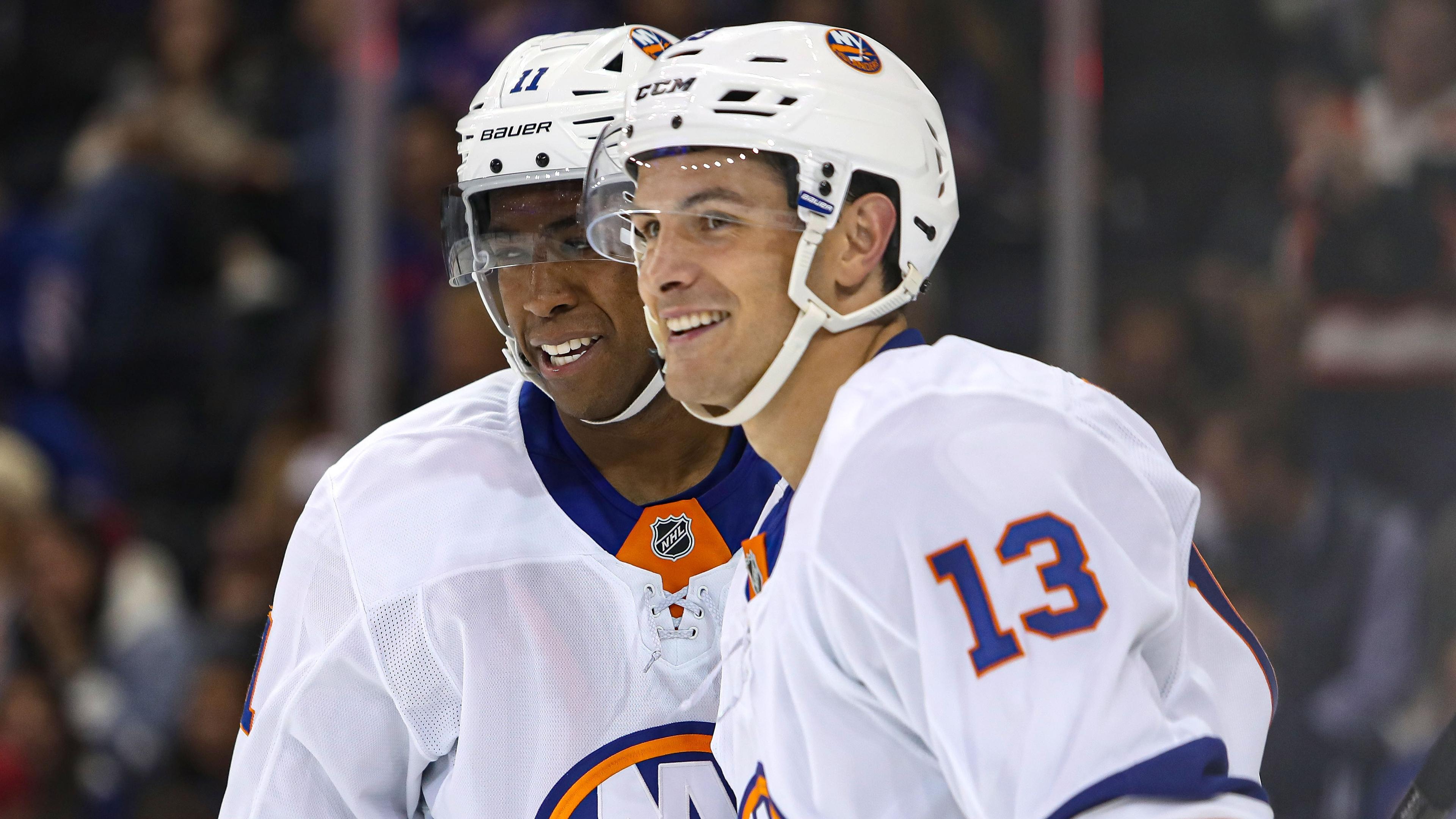 New York Islanders center Mathew Barzal (13) celebrates his goal with left wing Anthony Duclair (11) during the second period against the New York Rangers at Madison Square Garden