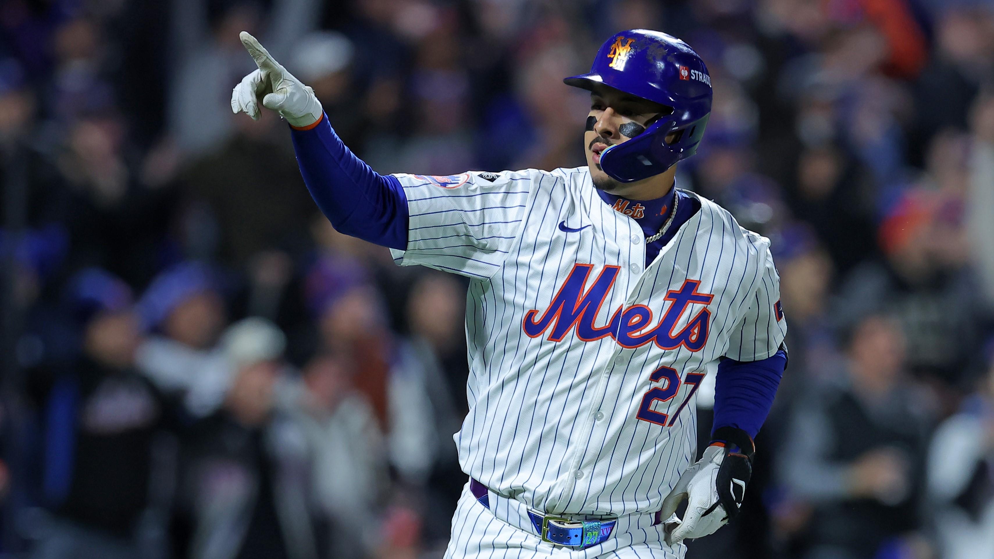 Oct 17, 2024; New York City, New York, USA; New York Mets third base Mark Vientos (27) reacts after hitting a home run against the Los Angeles Dodgers in the first inning during game four of the NLCS for the 2024 MLB playoffs at Citi Field. 