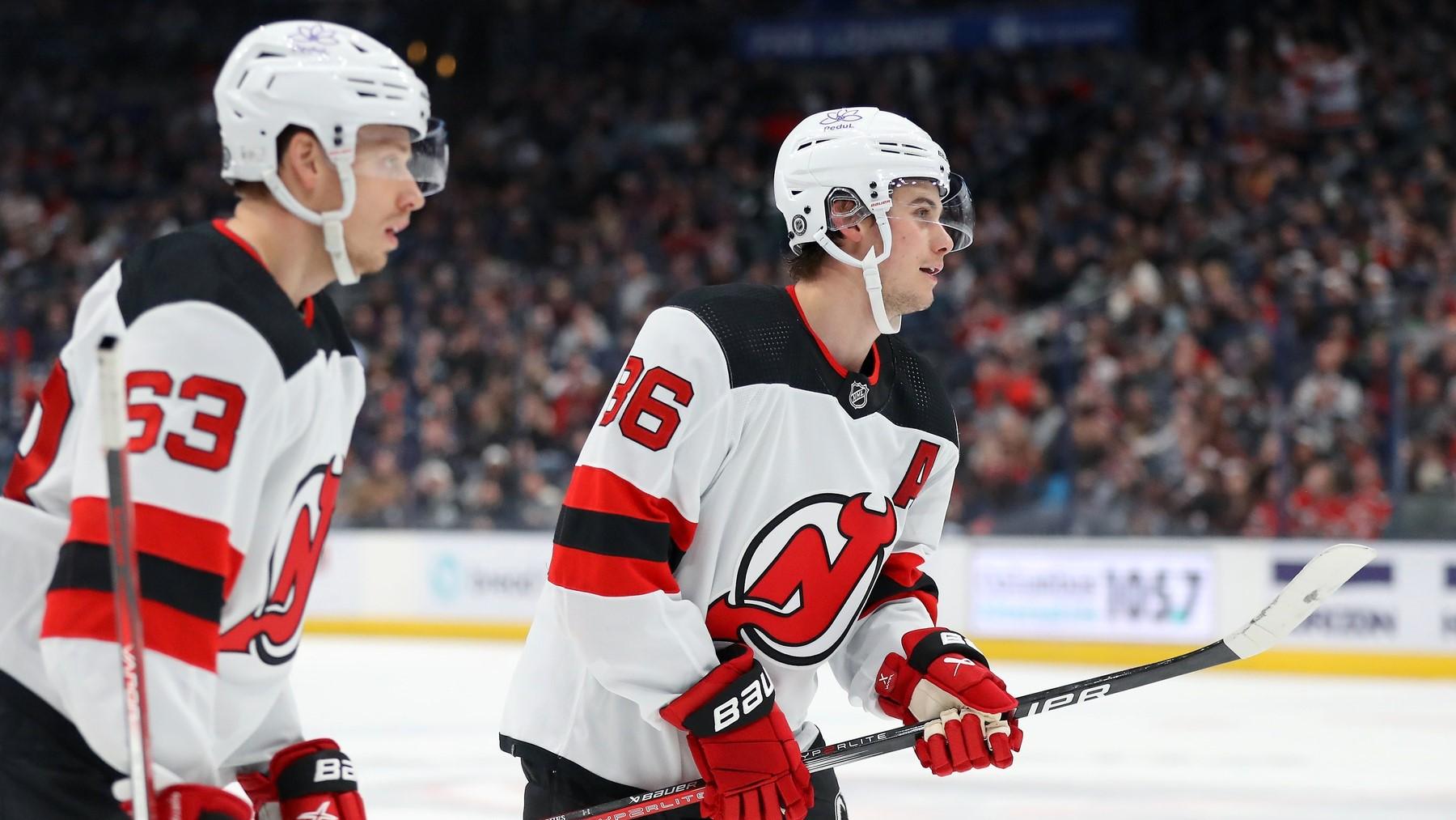 Dec 16, 2023; Columbus, Ohio, USA; New Jersey Devils center Jack Hughes (86) celebrates his second goal of the game with left wing Jesper Bratt (63) during the second period against the Columbus Blue Jackets at Nationwide Arena.