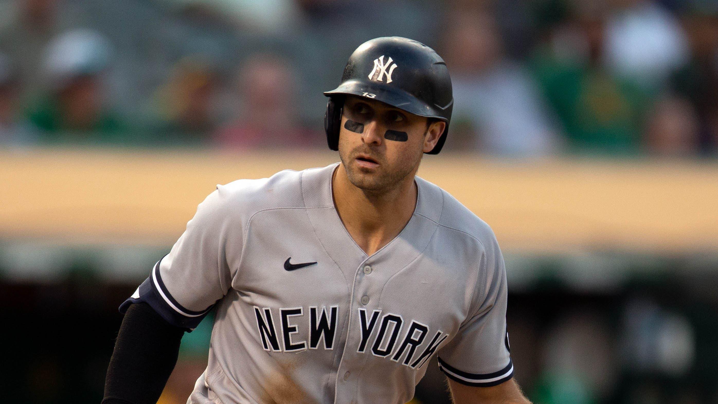 Aug 29, 2021; Oakland, California, USA; New York Yankees left fielder Joey Gallo (13) tosses the bat after drawing a walk against the Oakland Athletics during the eighth inning at RingCentral Coliseum. Mandatory Credit: D. Ross Cameron-USA TODAY Sports / D. Ross Cameron-USA TODAY Sports