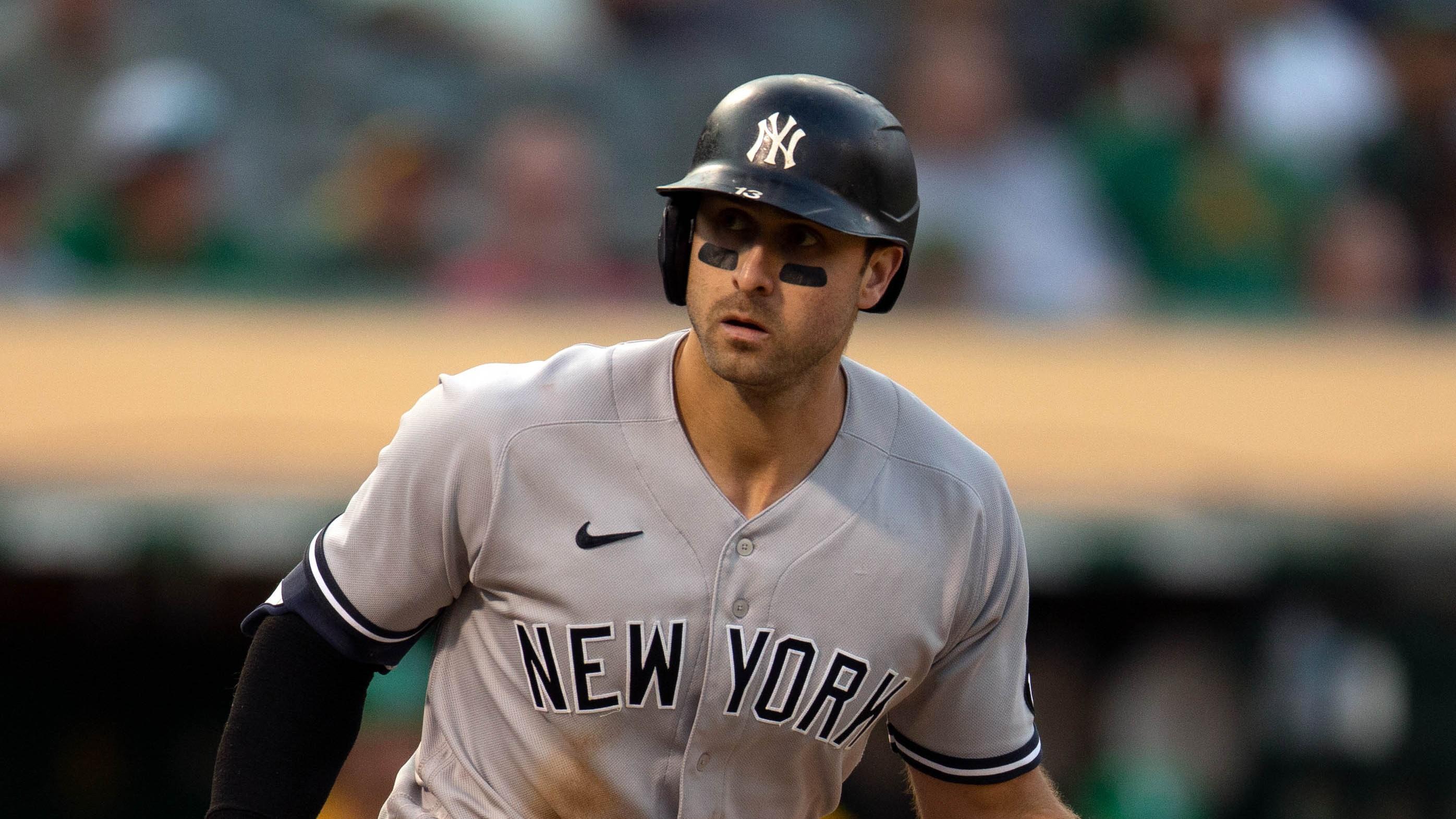 Aug 29, 2021; Oakland, California, USA; New York Yankees left fielder Joey Gallo (13) tosses the bat after drawing a walk against the Oakland Athletics during the eighth inning at RingCentral Coliseum. Mandatory Credit: D. Ross Cameron-USA TODAY Sports