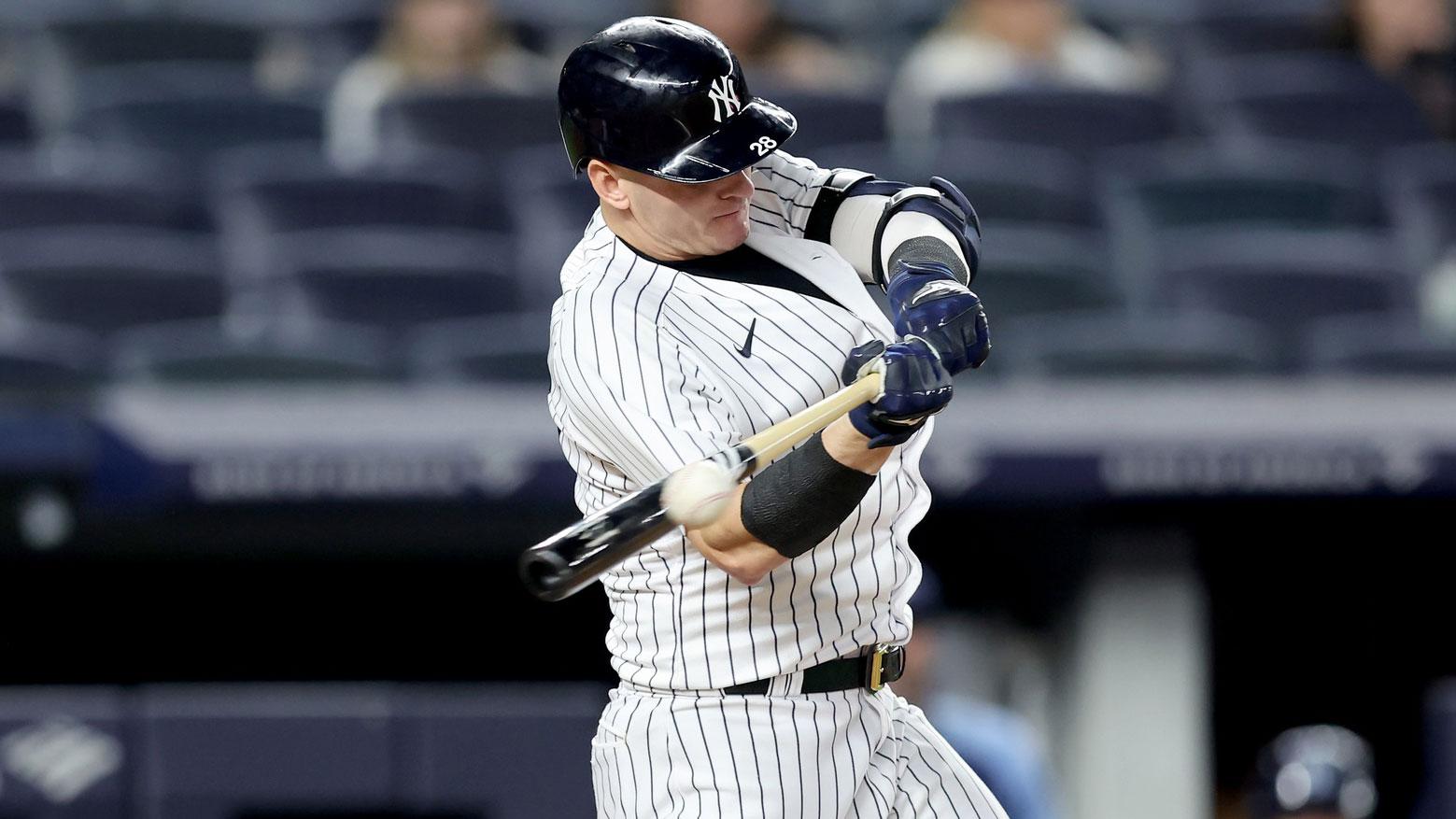 Aug 17, 2022; Bronx, New York, USA; New York Yankees designated hitter Josh Donaldson (28) hits a game winning grand slam against the Tampa Bay Rays during the tenth inning at Yankee Stadium.