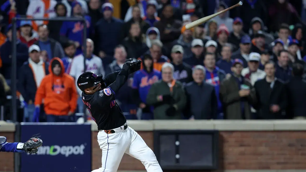 New York Mets catcher Francisco Alvarez (4) bat slips out of his hands against the Los Angeles Dodgers in the second inning during game three of the NLCS for the 2024 MLB playoffs at Citi Field. / Brad Penner-Imagn Images