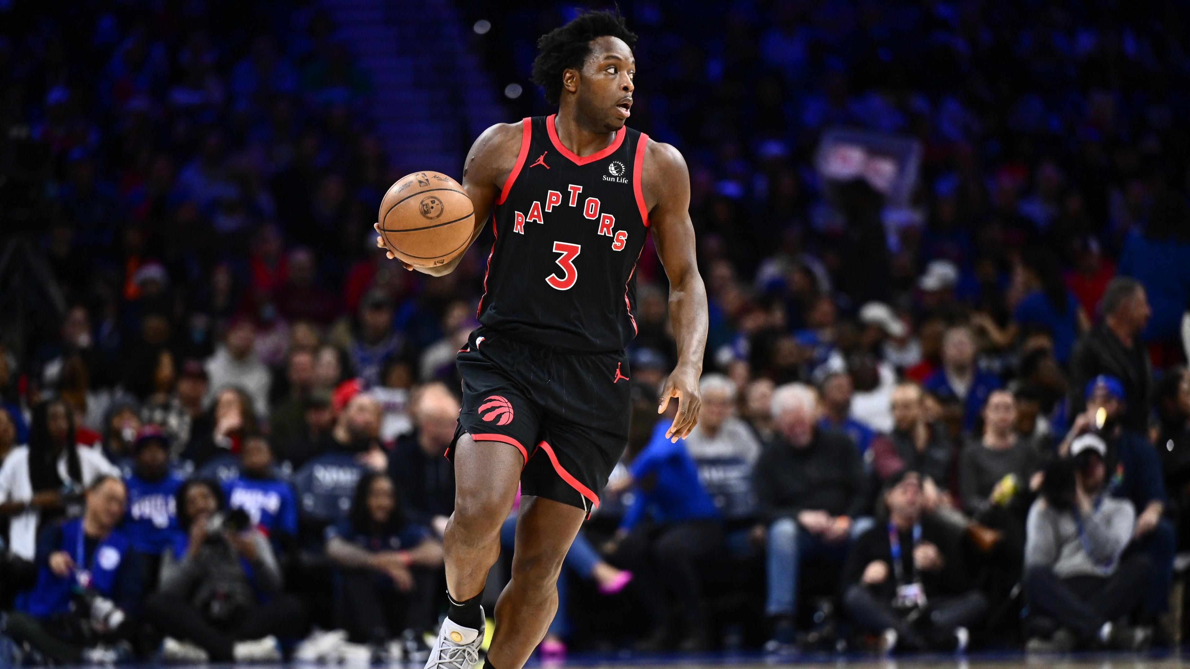 Dec 22, 2023; Philadelphia, Pennsylvania, USA; Toronto Raptors forward OG Anunoby (3) controls the ball against the Philadelphia 76ers in the third quarter at Wells Fargo Center.