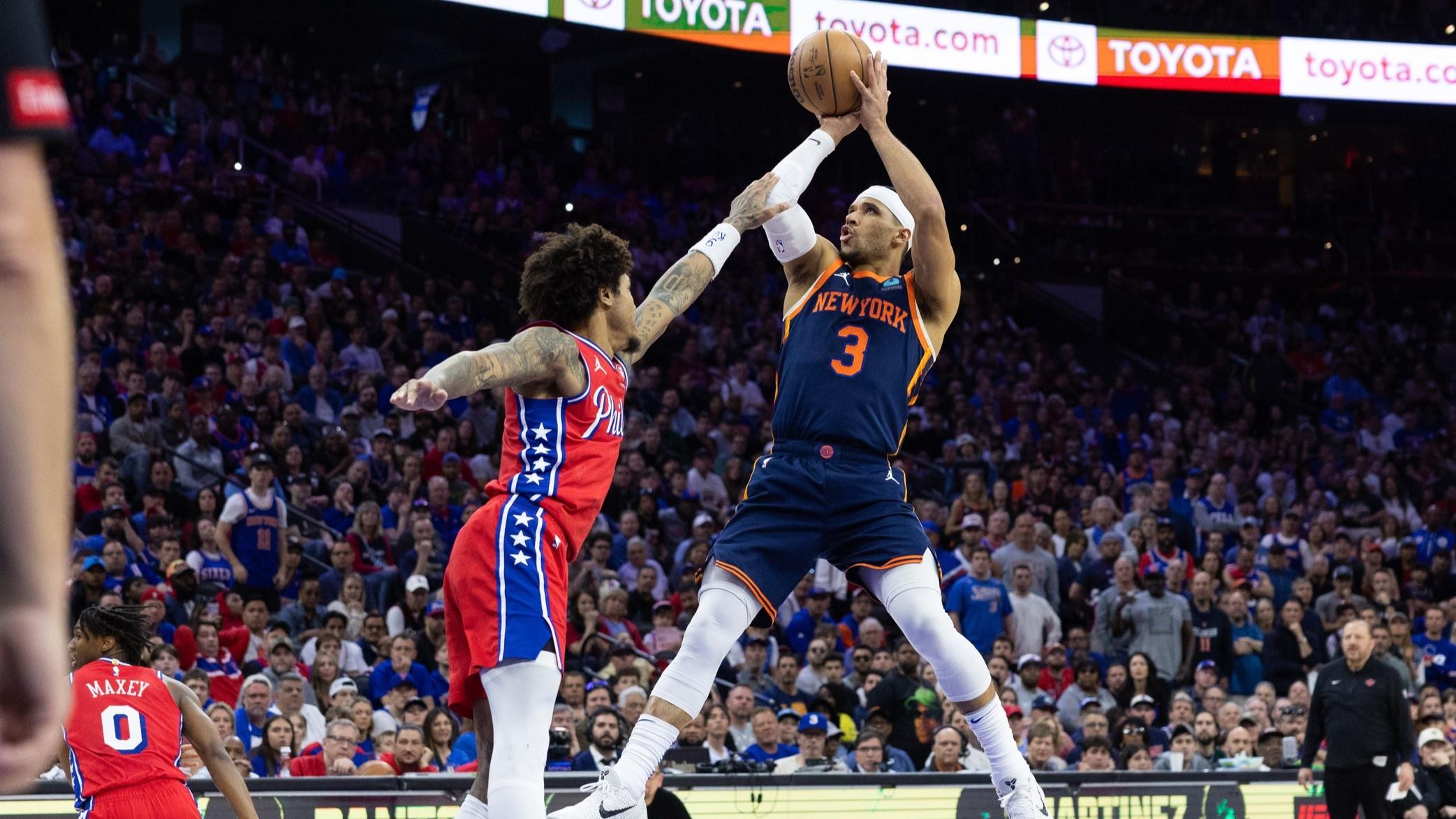 Apr 28, 2024; Philadelphia, Pennsylvania, USA; New York Knicks guard Josh Hart (3) shoots against Philadelphia 76ers guard Kelly Oubre Jr. (9) during the second half of game four of the first round in the 2024 NBA playoffs at Wells Fargo Center.