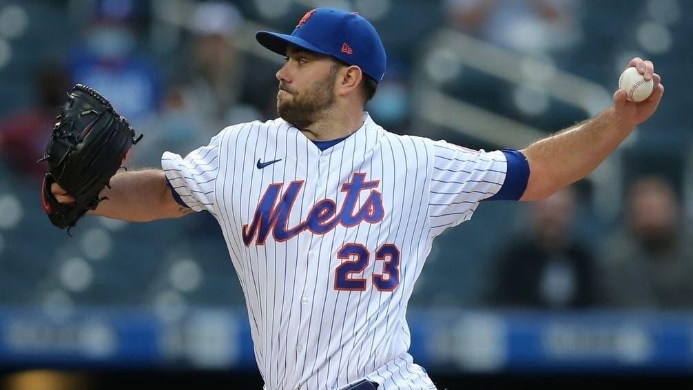 May 24, 2021; New York City, New York, USA; New York Mets starting pitcher David Peterson (23) pitches against the Colorado Rockies during the first inning at Citi Field. / Brad Penner-USA TODAY Sports