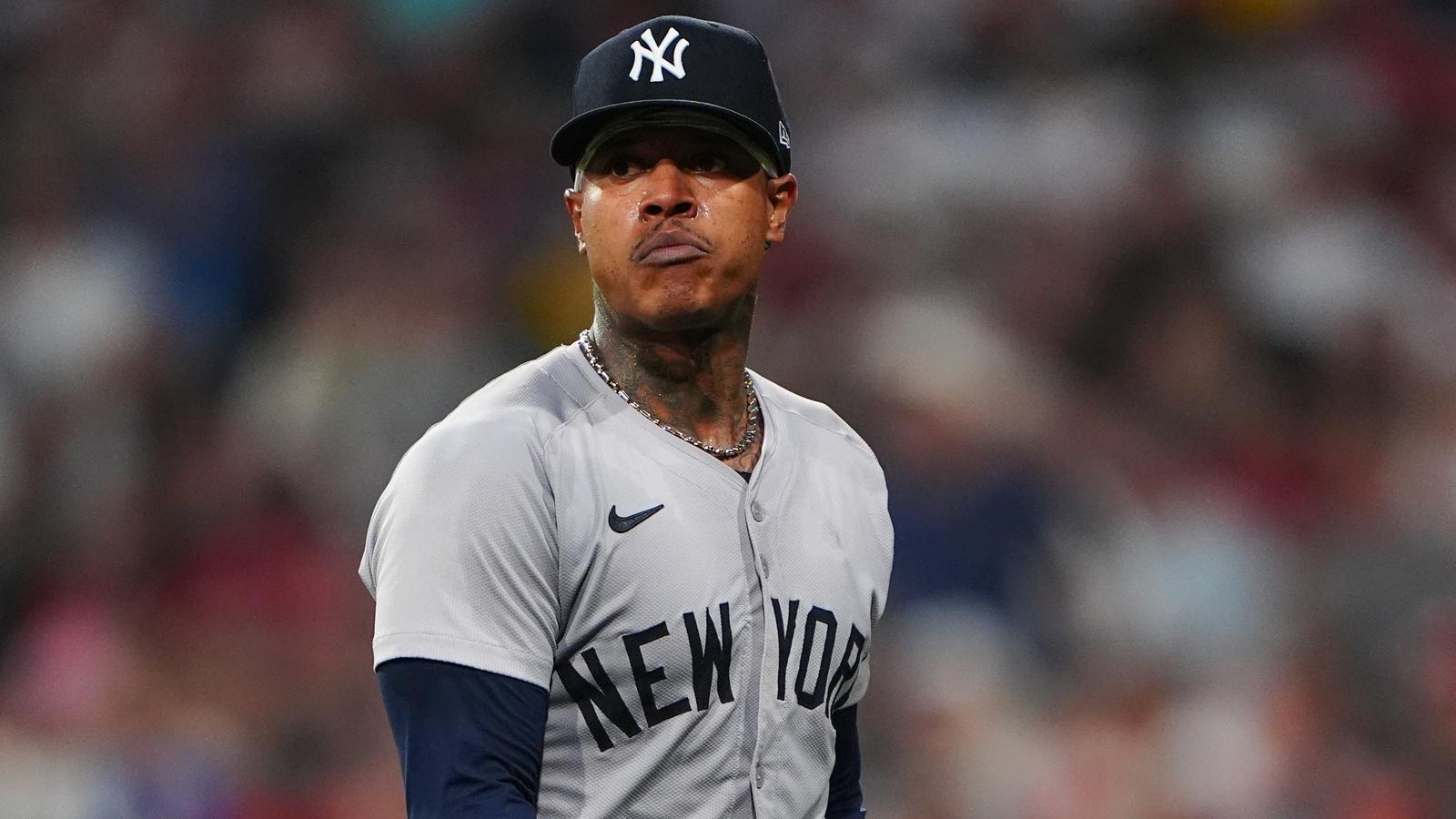 New York Yankees pitcher Marcus Stroman (0) walks to the dugout after being taken out of the game against the Boston Red Sox during the fourth inning at Fenway Park.