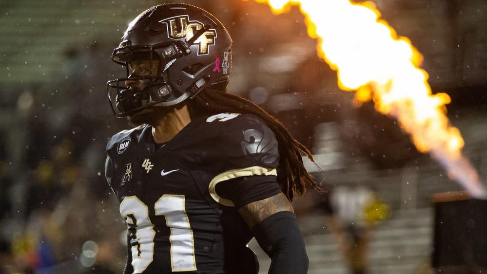 Oct 3, 2020; Orlando, Florida, USA; UCF Knights defensive back Aaron Robinson (31) runs out of the tunnel during team introductions before a game against the Tulsa Golden Hurricane at Spectrum Stadium.