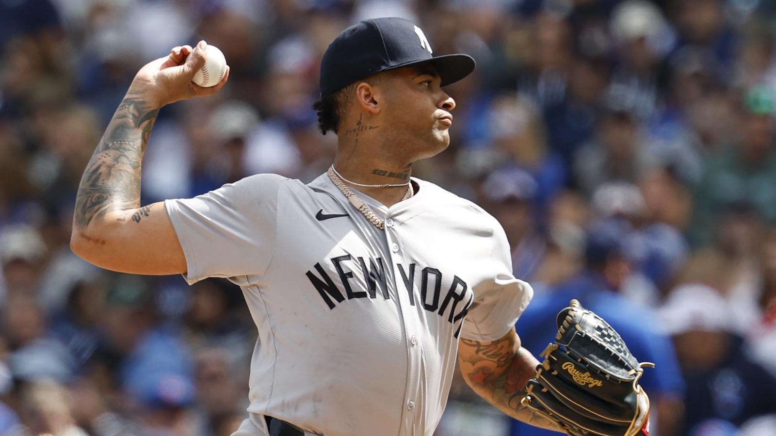 New York Yankees starting pitcher Luis Gil (81) delivers a pitch against the Chicago Cubs during the first inning at Wrigley Field.