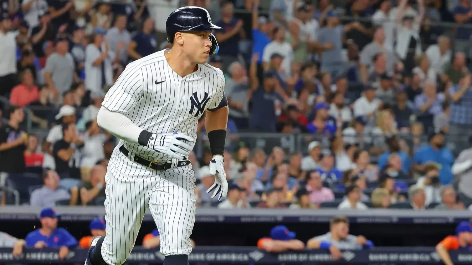 Aug 23, 2022; Bronx, New York, USA; New York Yankees right fielder Aaron Judge (99) watches his RBI single during the seventh inning against the New York Mets at Yankee Stadium. / Vincent Carchietta-USA TODAY Sports