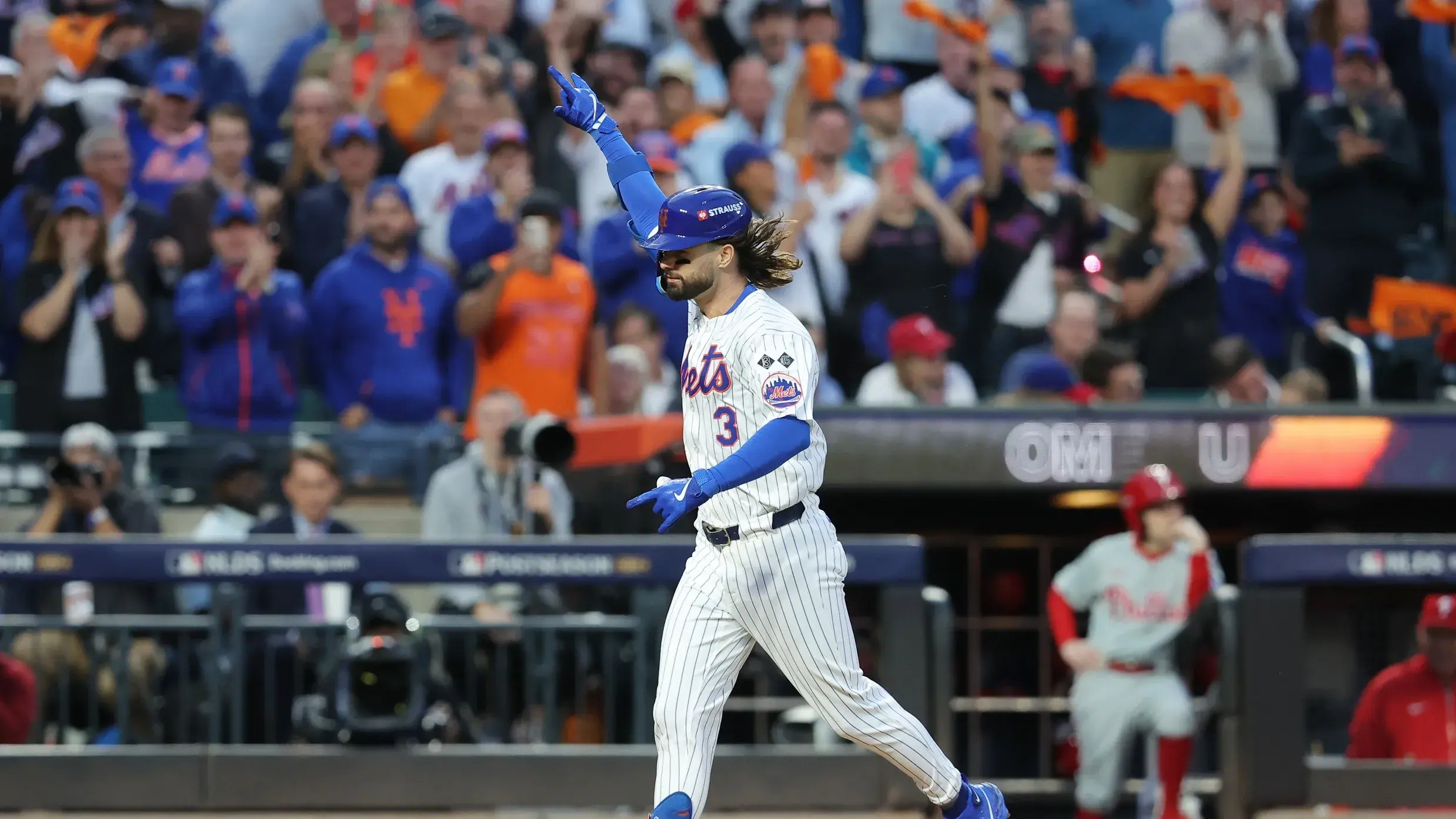 New York Mets outfielder Jesse Winker (3) celebrates after hitting a solo home run in the fourth inning against the Philadelphia Phillies during game three of the NLDS for the 2024 MLB Playoffs at Citi Field. / Brad Penner-Imagn Images