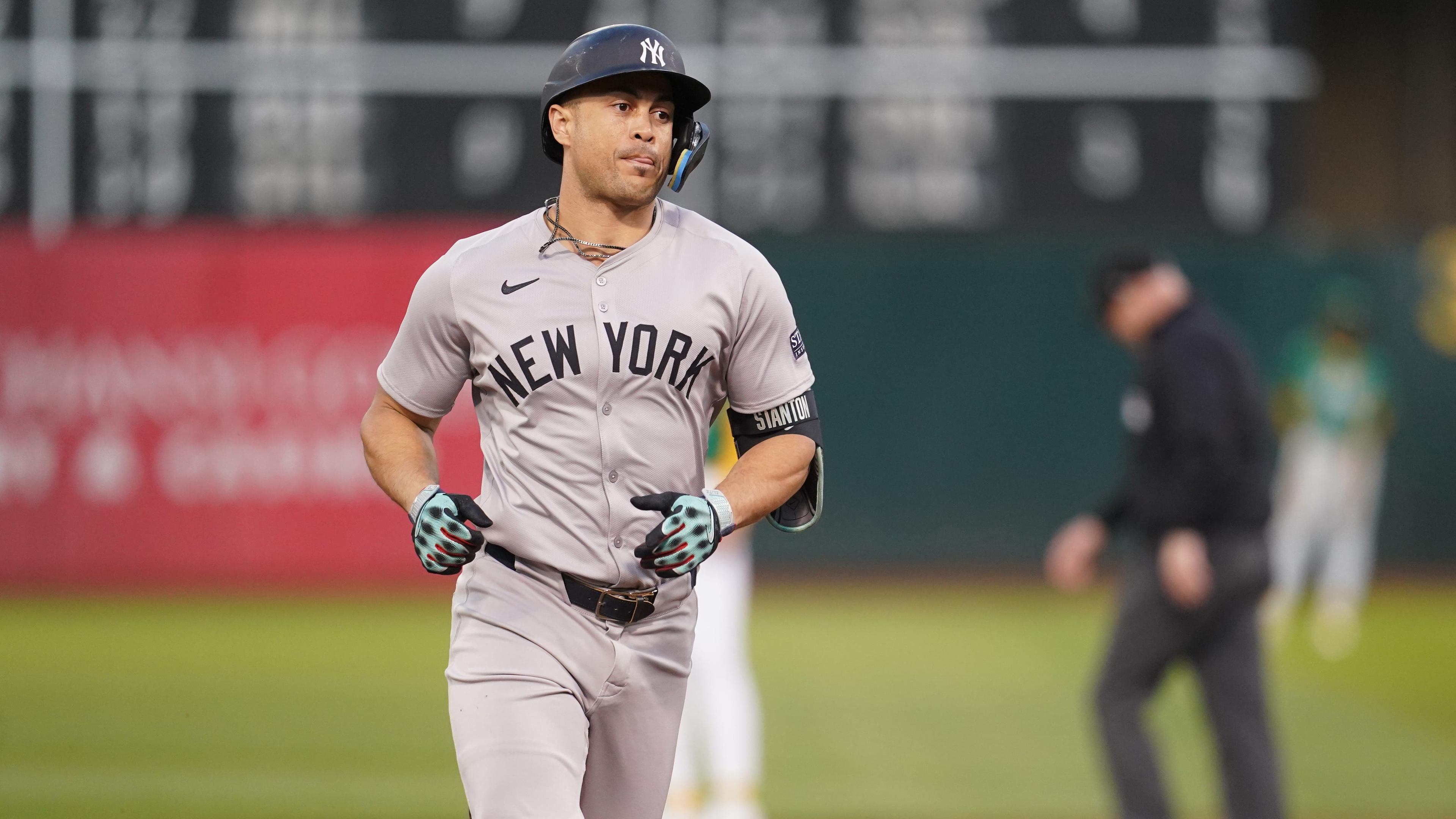 New York Yankees designated hitter Giancarlo Stanton (27) prepares to round third base after hitting a three-run home run against the Oakland Athletics in the third inning at the Oakland-Alameda County Coliseum. / Cary Edmondson-Imagn Images