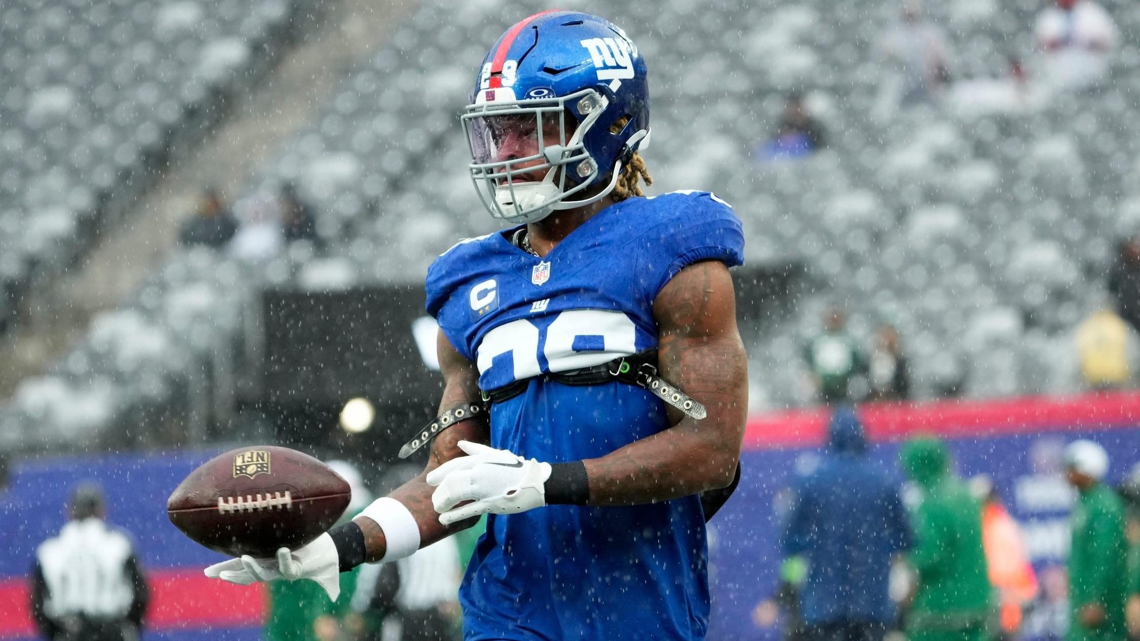 October 29, 2023; East Rutherford, NJ, USA; New York Giants safety Xavier McKinney (29) is shown with the ball during a pregame warm-up.