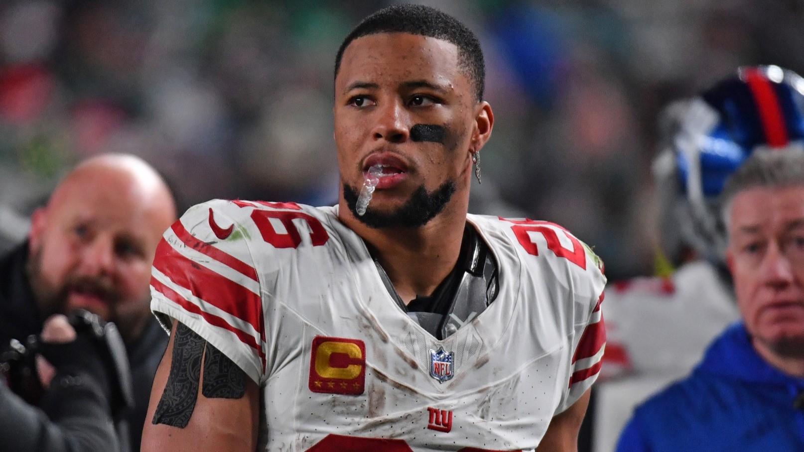 Dec 25, 2023; Philadelphia, Pennsylvania, USA; New York Giants running back Saquon Barkley (26) against the Philadelphia Eagles at Lincoln Financial Field. 