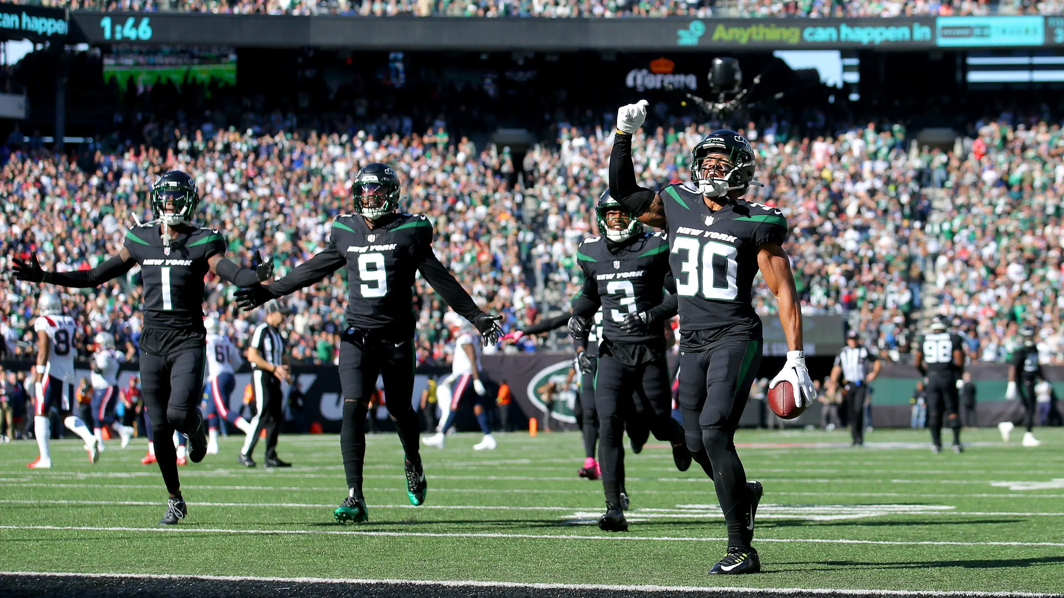 Oct 30, 2022; East Rutherford, New Jersey, USA; New York Jets cornerback Michael Carter II (30) celebrates after an interception against the New England Patriots during the second quarter at MetLife Stadium. Mandatory Credit: Brad Penner-USA TODAY Sports / © Brad Penner-USA TODAY Sports