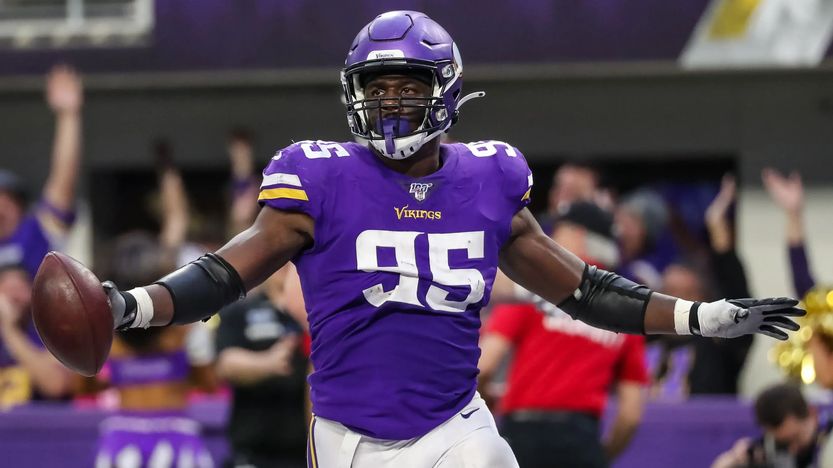 Dec 29, 2019; Minneapolis, Minnesota, USA; Minnesota Vikings defensive end Ifeadi Odenigbo (95) celebrates his fumble recovery during the fourth quarter against the Chicago Bears at U.S. Bank Stadium. / Brace Hemmelgarn-USA TODAY Sports