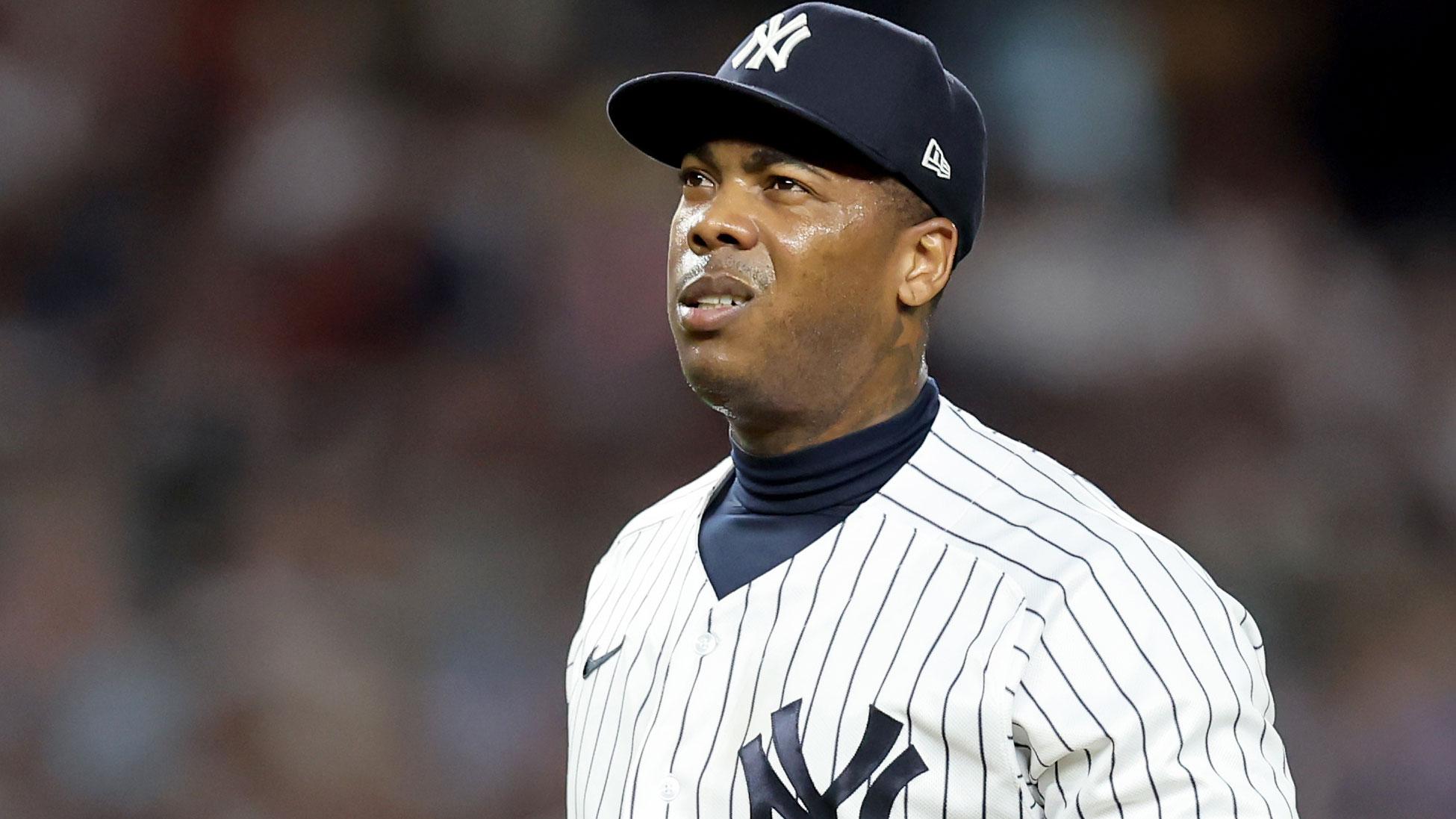 Jul 15, 2022; Bronx, New York, USA; New York Yankees relief pitcher Aroldis Chapman (54) reacts during the seventh inning against the Boston Red Sox at Yankee Stadium.