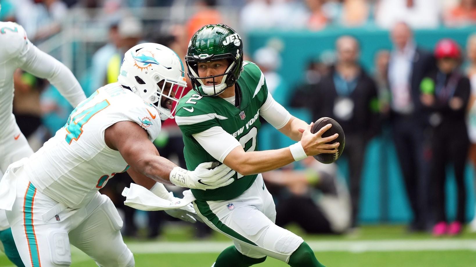 Miami Dolphins defensive tackle Christian Wilkins (94) rushes in on New York Jets quarterback Zach Wilson (2) during the first half at Hard Rock Stadium.