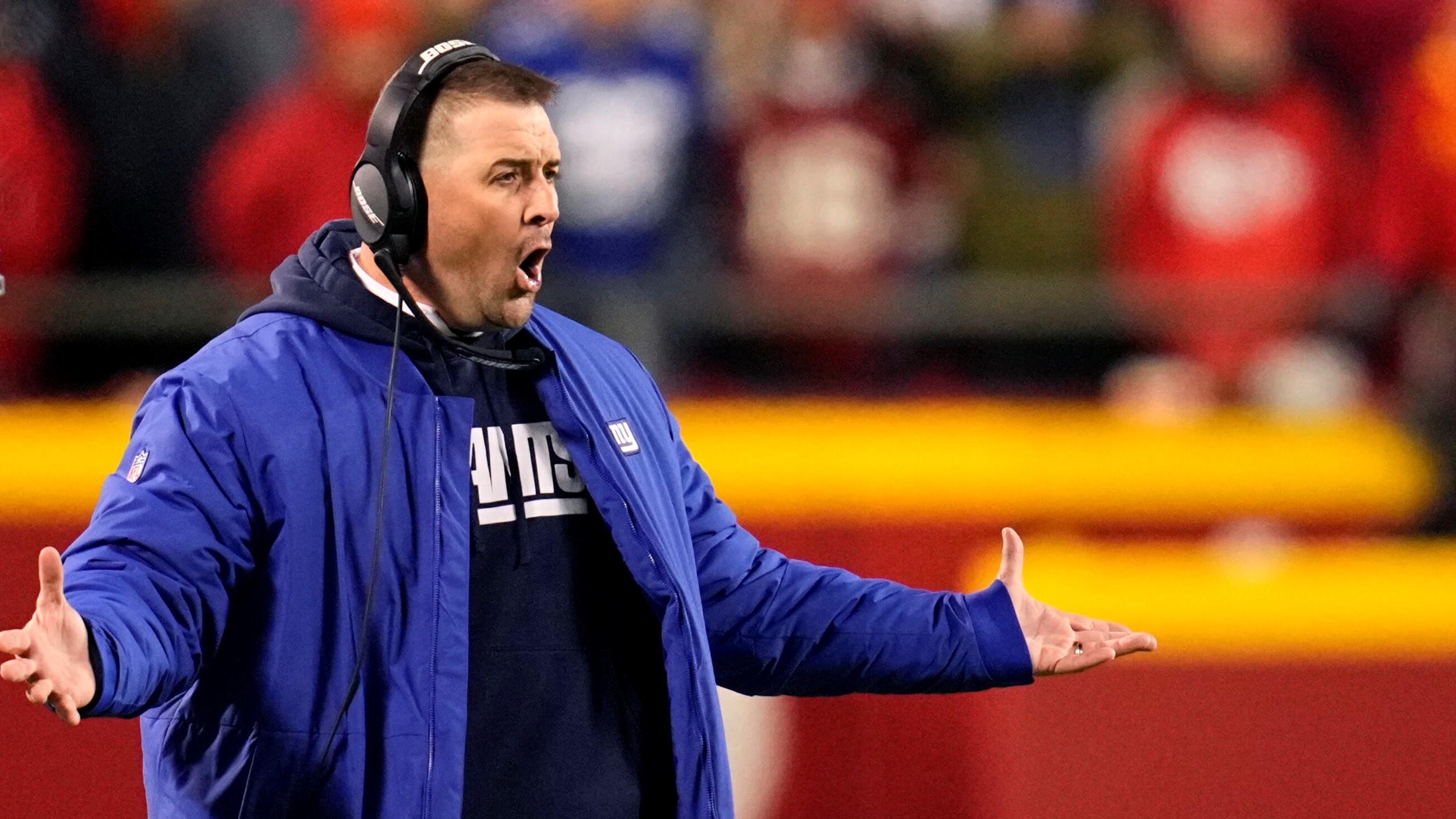 Nov 1, 2021; Kansas City, Missouri, USA; New York Giants head coach Joe Judge (right) reacts to a penalty during the second half against the Kansas City Chiefs at GEHA Field at Arrowhead Stadium. Mandatory Credit: Jay Biggerstaff-USA TODAY Sports