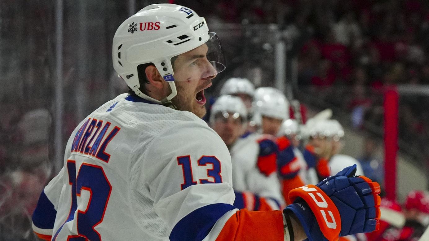 New York Islanders center Mathew Barzal (13) celebrates his goal against the Carolina Hurricanes during the second period in game five of the first round of the 2023 Stanley Cup Playoffs at PNC Arena