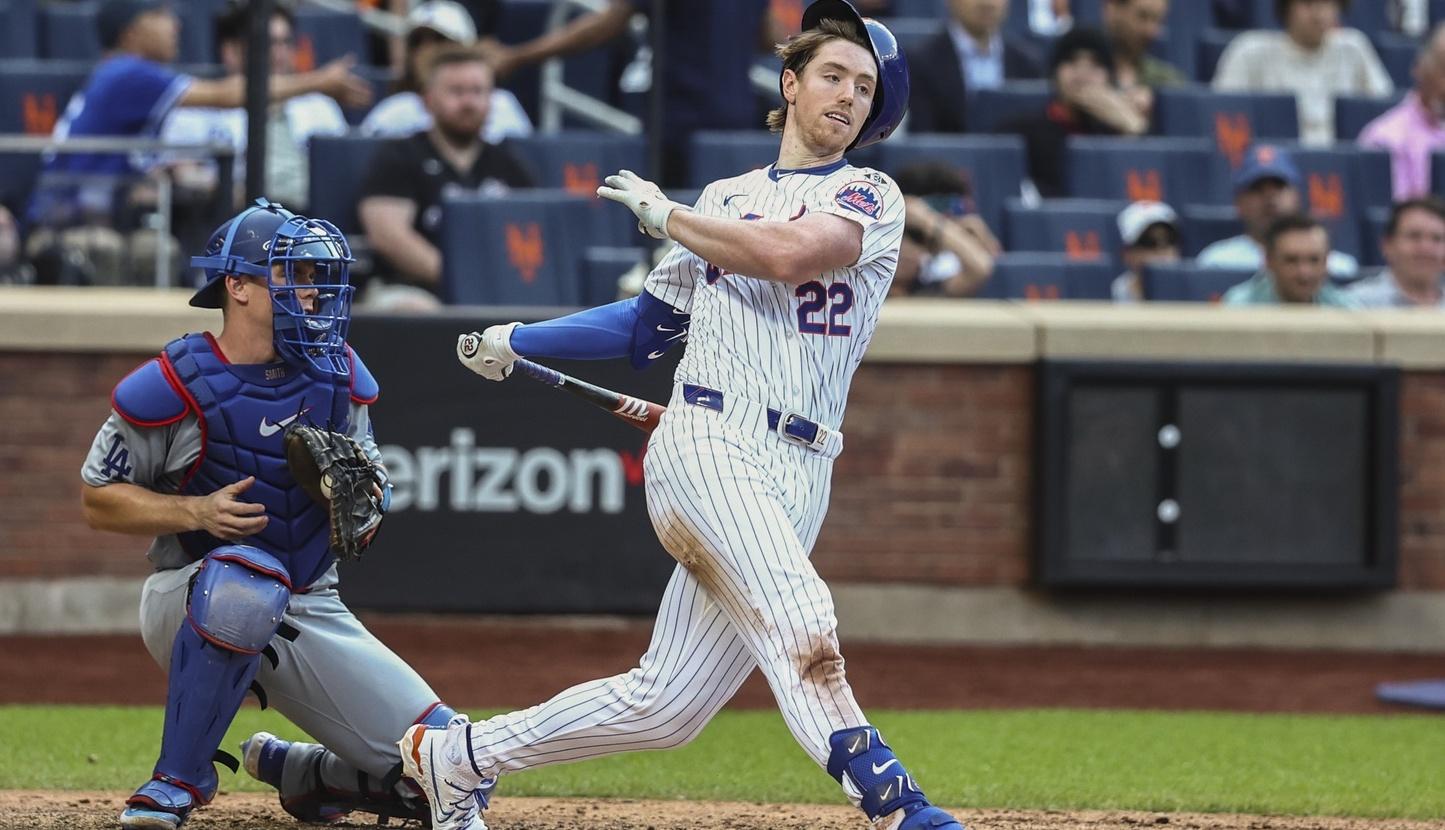 New York Mets third baseman Brett Baty (22) strikes out with two runners on base to end the sixth inning against the Los Angeles Dodgers at Citi Field.