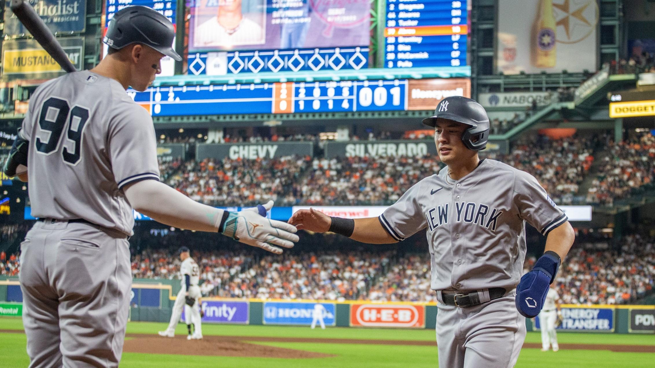 Sep 2, 2023; Houston, Texas, USA; New York Yankees right fielder Aaron Judge (99) celebrates left fielder Everson Pereira (80) run against the Houston Astros in the second inning at Minute Maid Park.