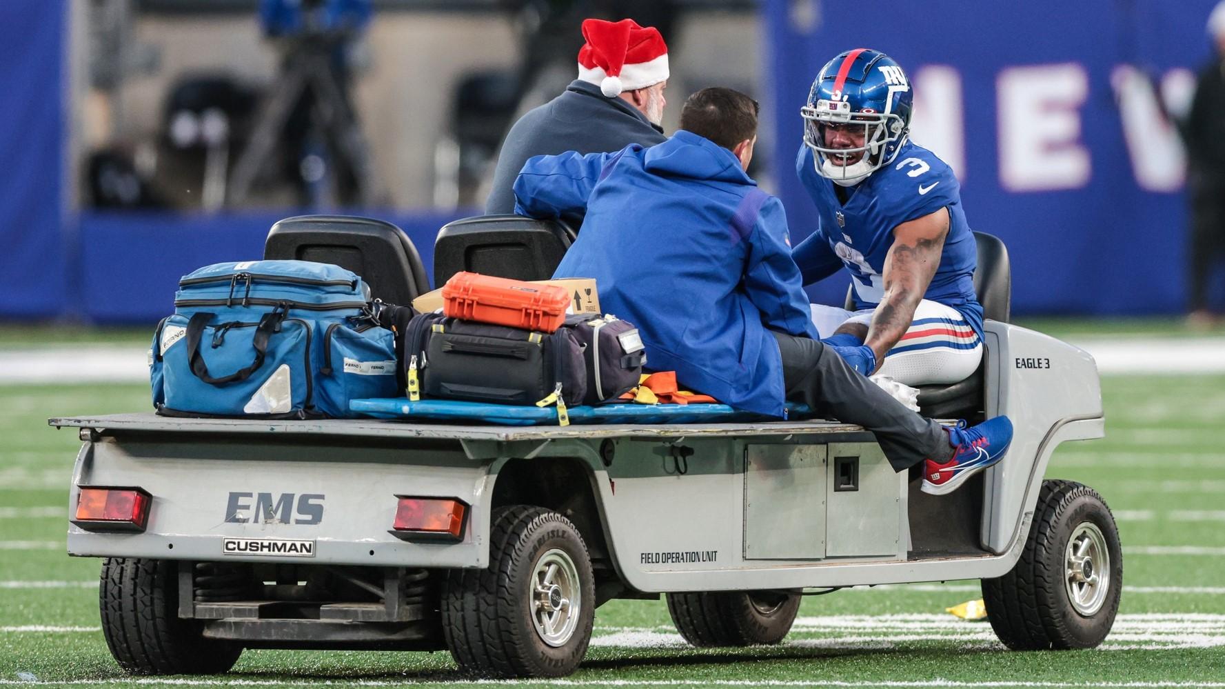 Dec 19, 2021; East Rutherford, New Jersey, USA; New York Giants wide receiver Sterling Shepard (3) is driven off of the field after an injury during the second half against the Dallas Cowboys at MetLife Stadium.